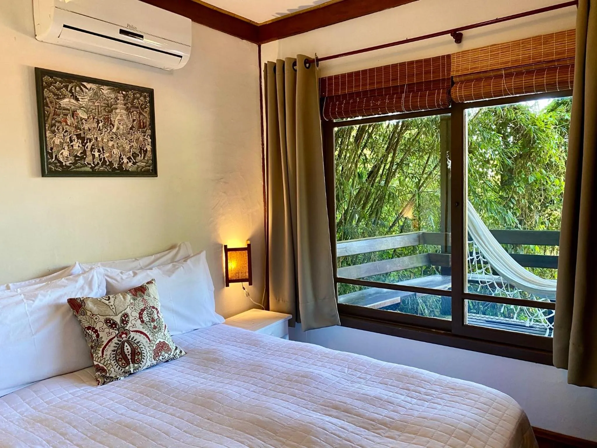 Bed in Pousada Bungalow