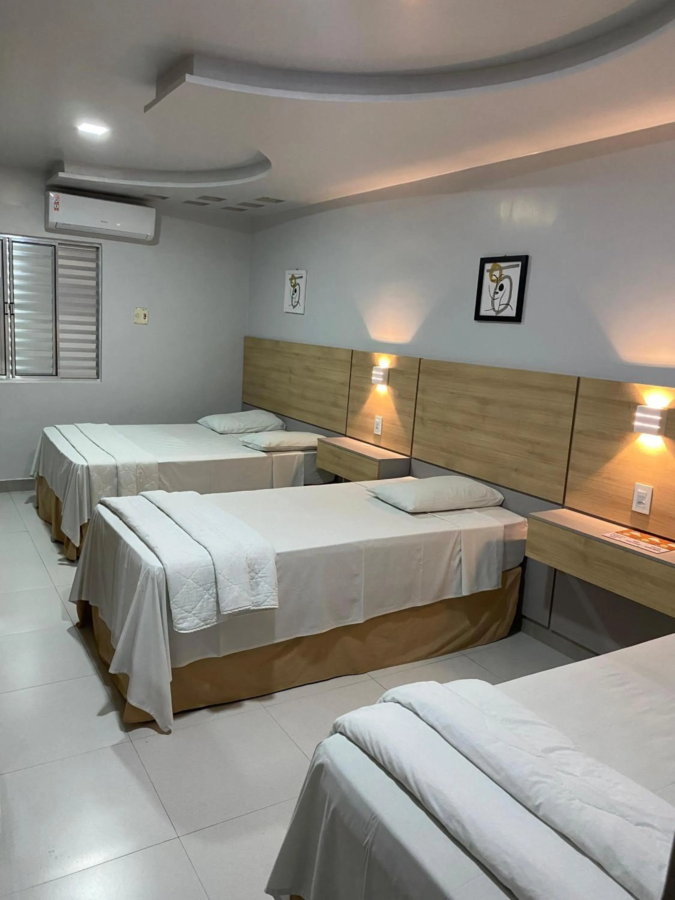 Bed in Augusto Palace Hotel