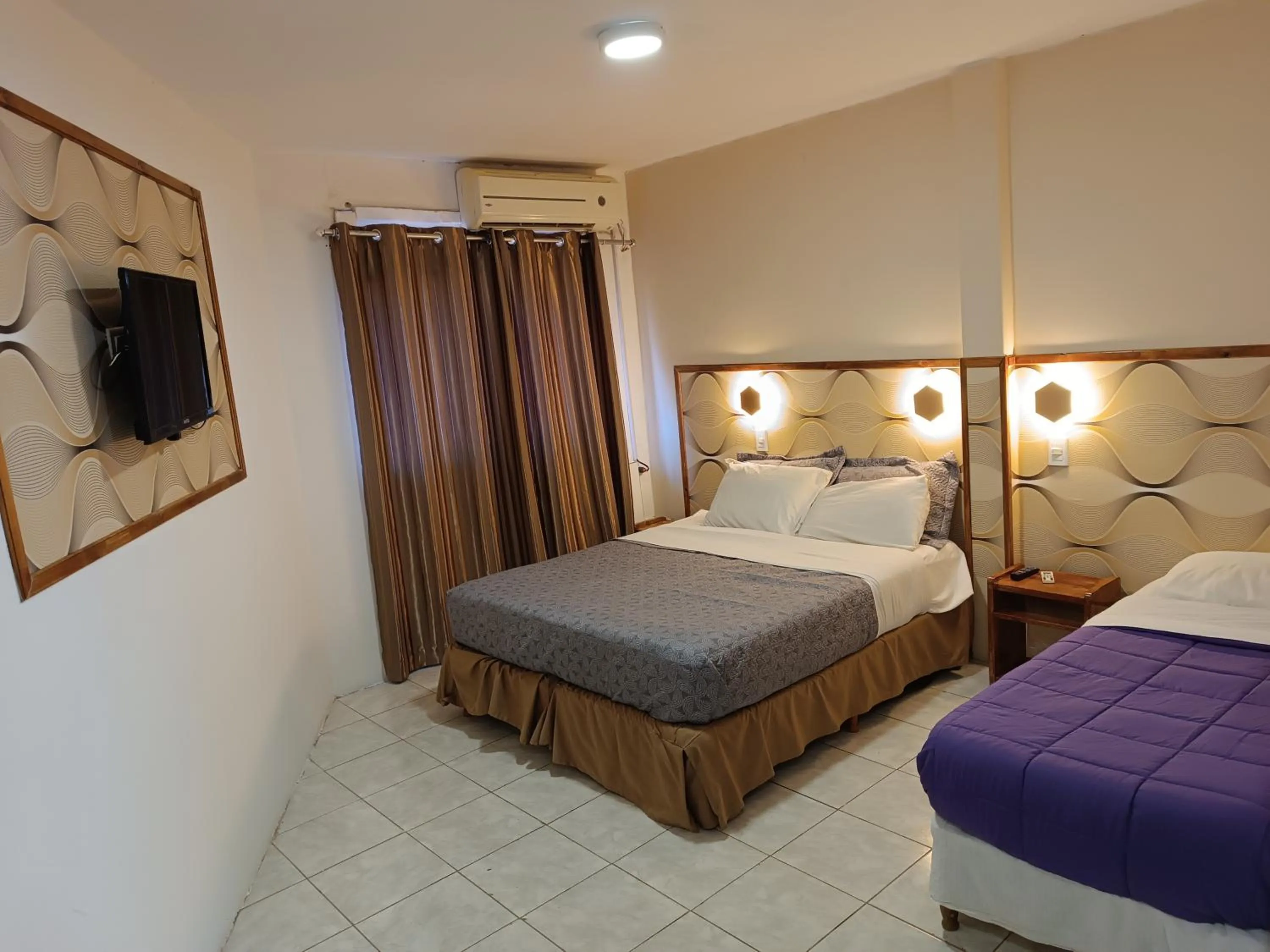 Bed in Hotel La Gran Manzana