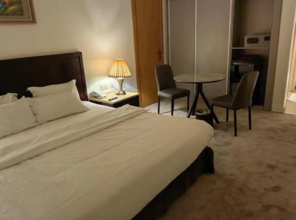 Bed in Al Furat Madayin Hotel