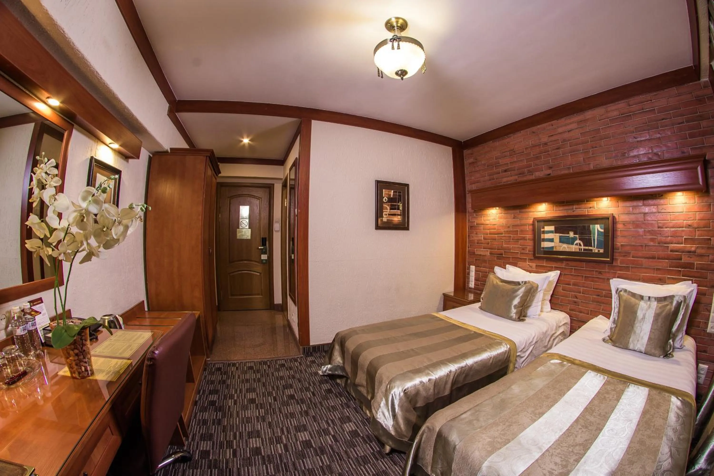 Bed in Hotel Uyut Almaty