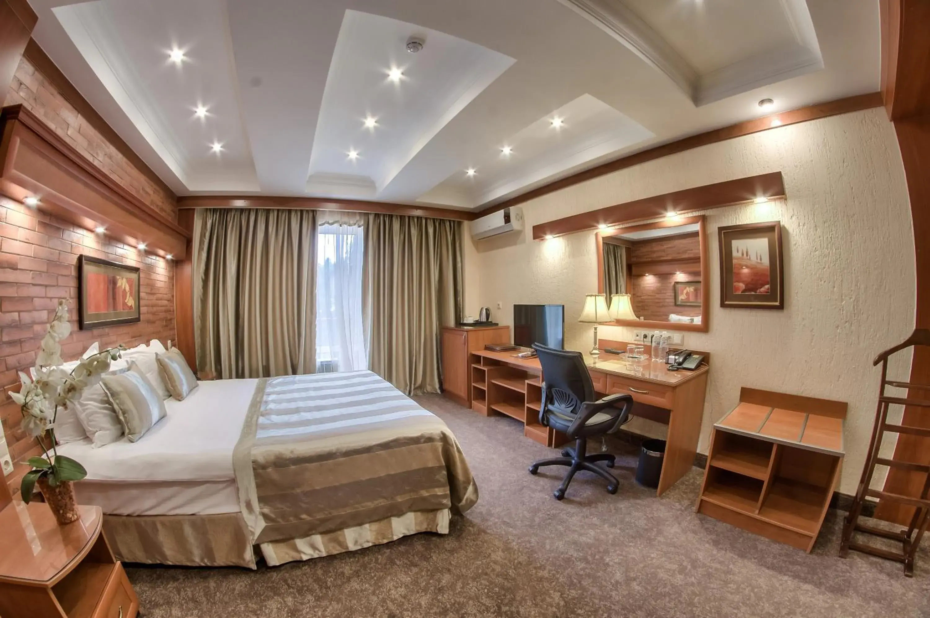 Photo of the whole room, Bed in Hotel Uyut Almaty Photo of the whole room, Bed in Hotel Uyut Almaty