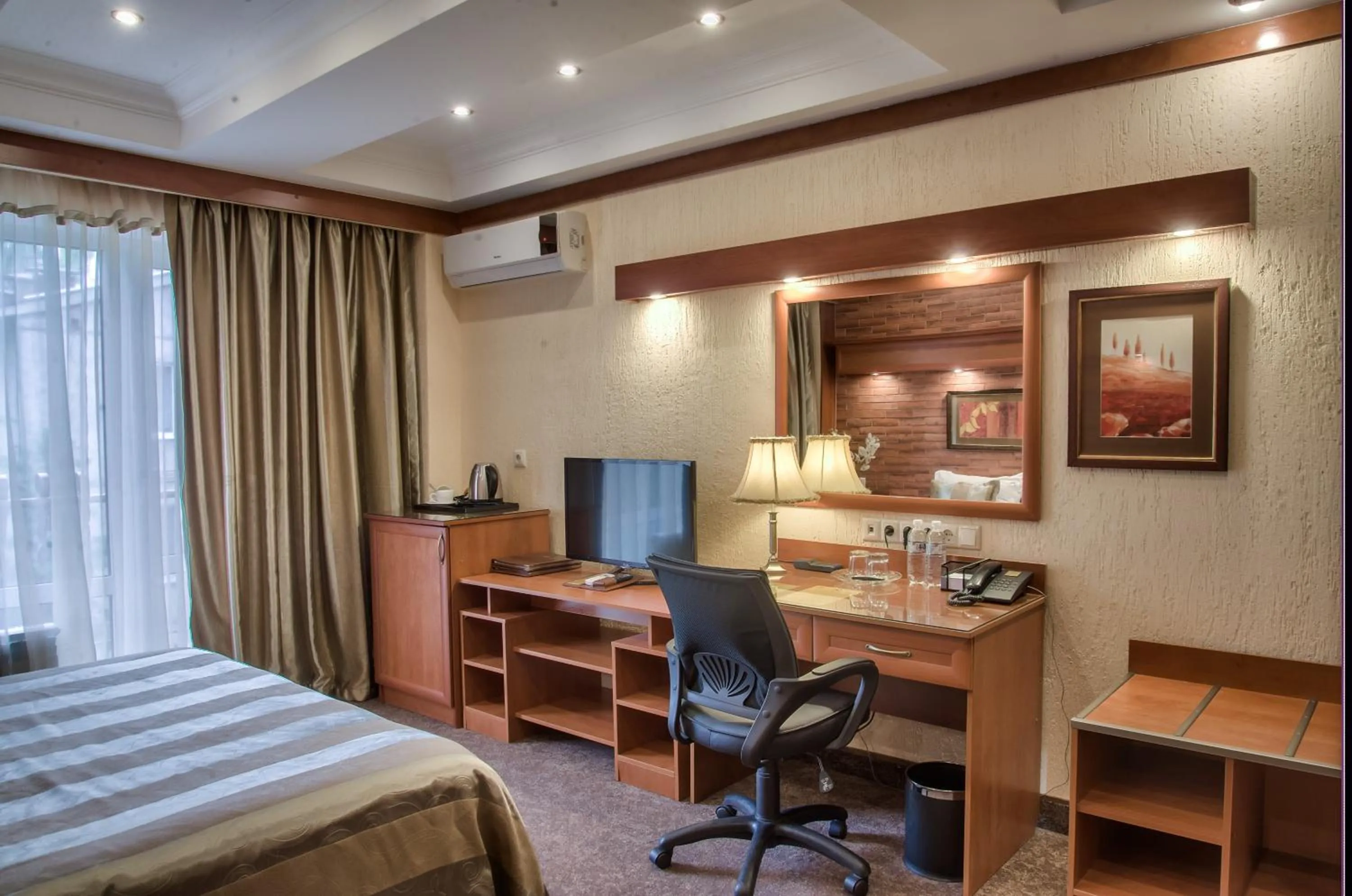 Property building, Bed in Hotel Uyut Almaty