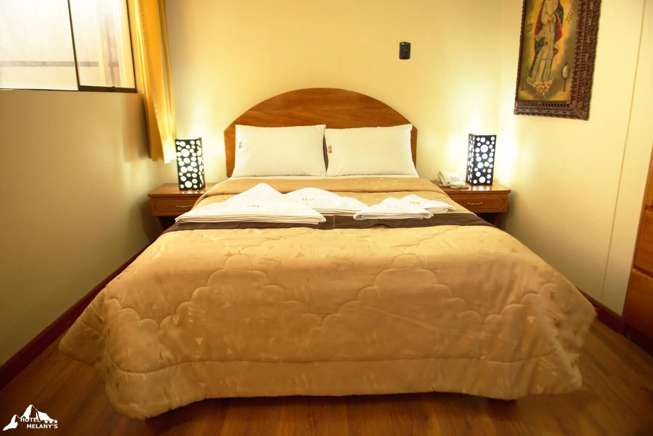 Bed in Hotel Melanys