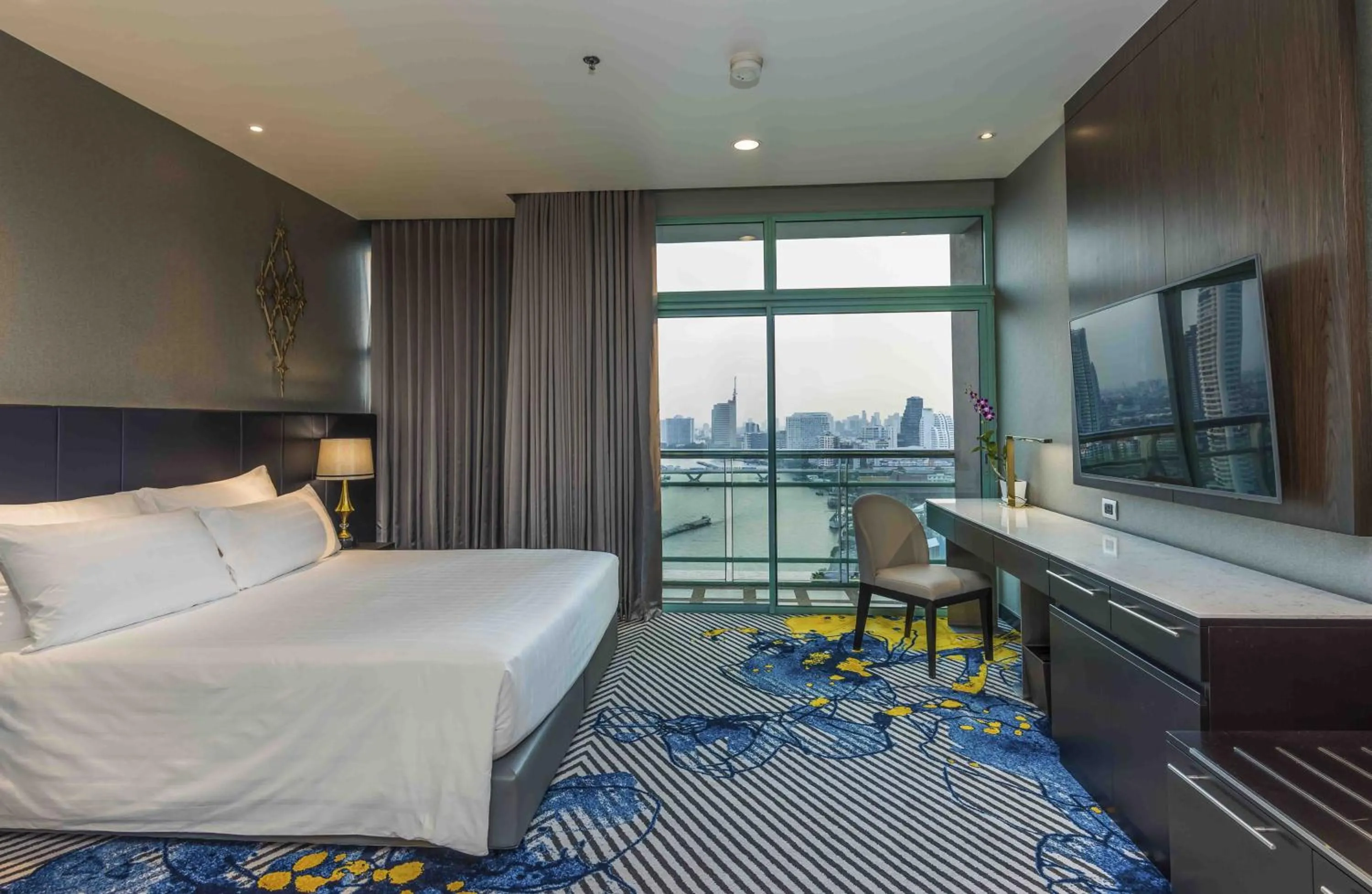 Bed in Chatrium Hotel Riverside Bangkok