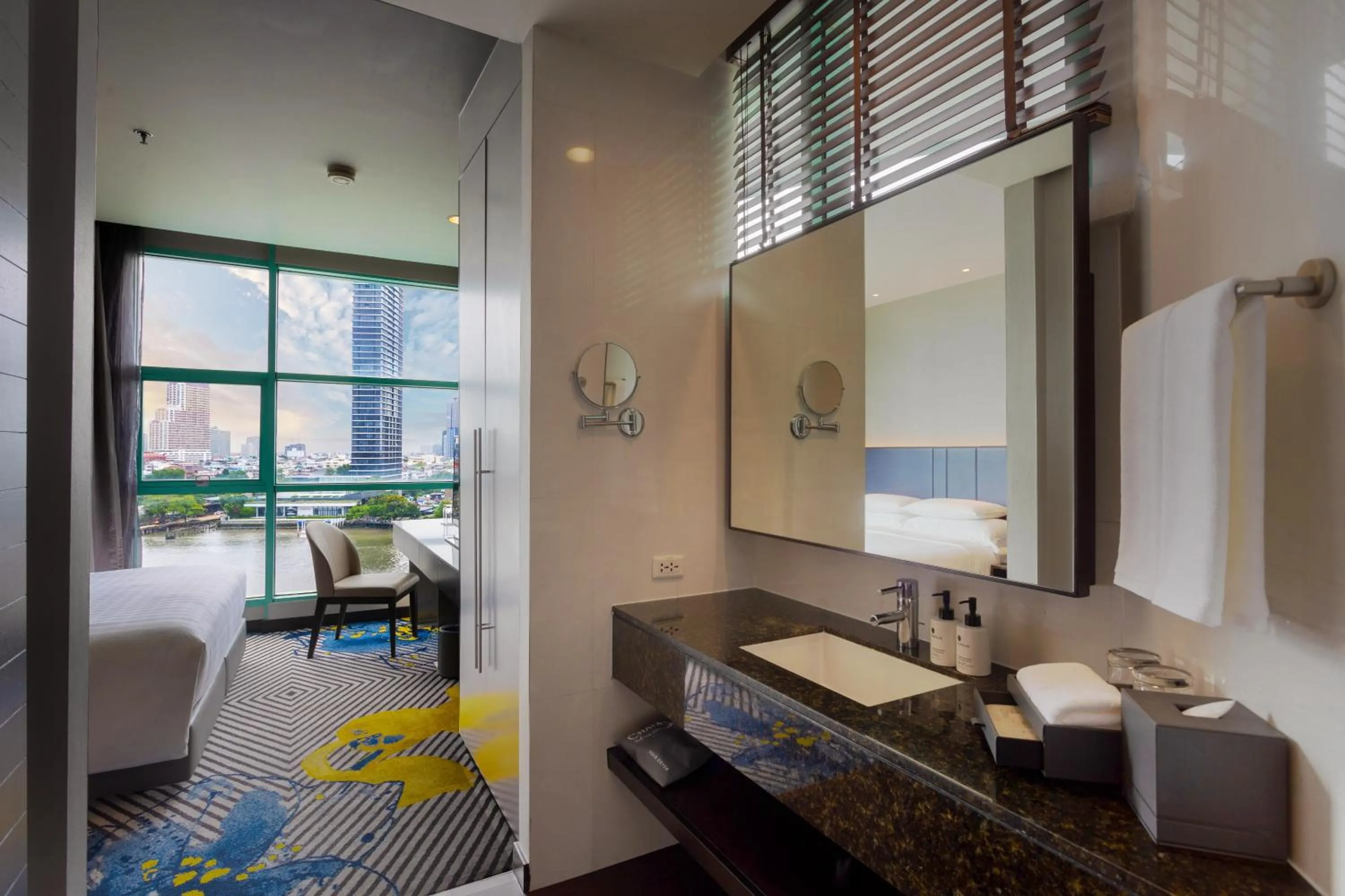 Photo of the whole room, Bed in Chatrium Hotel Riverside Bangkok