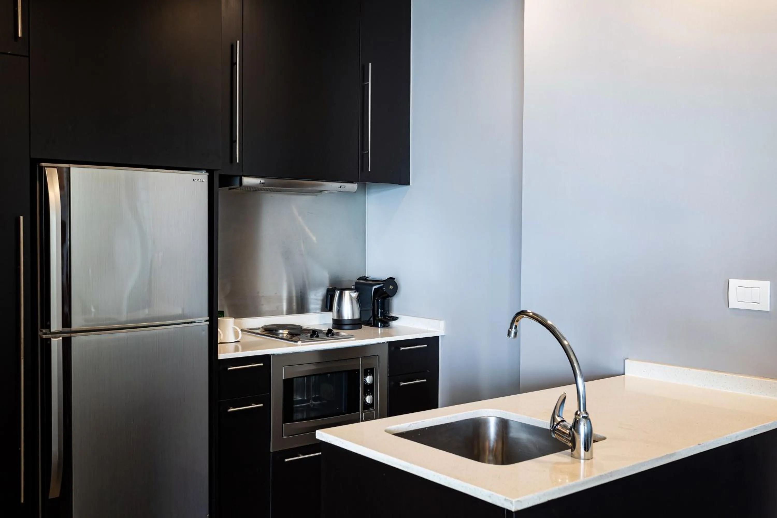 Kitchen or kitchenette in Chatrium Hotel Riverside Bangkok