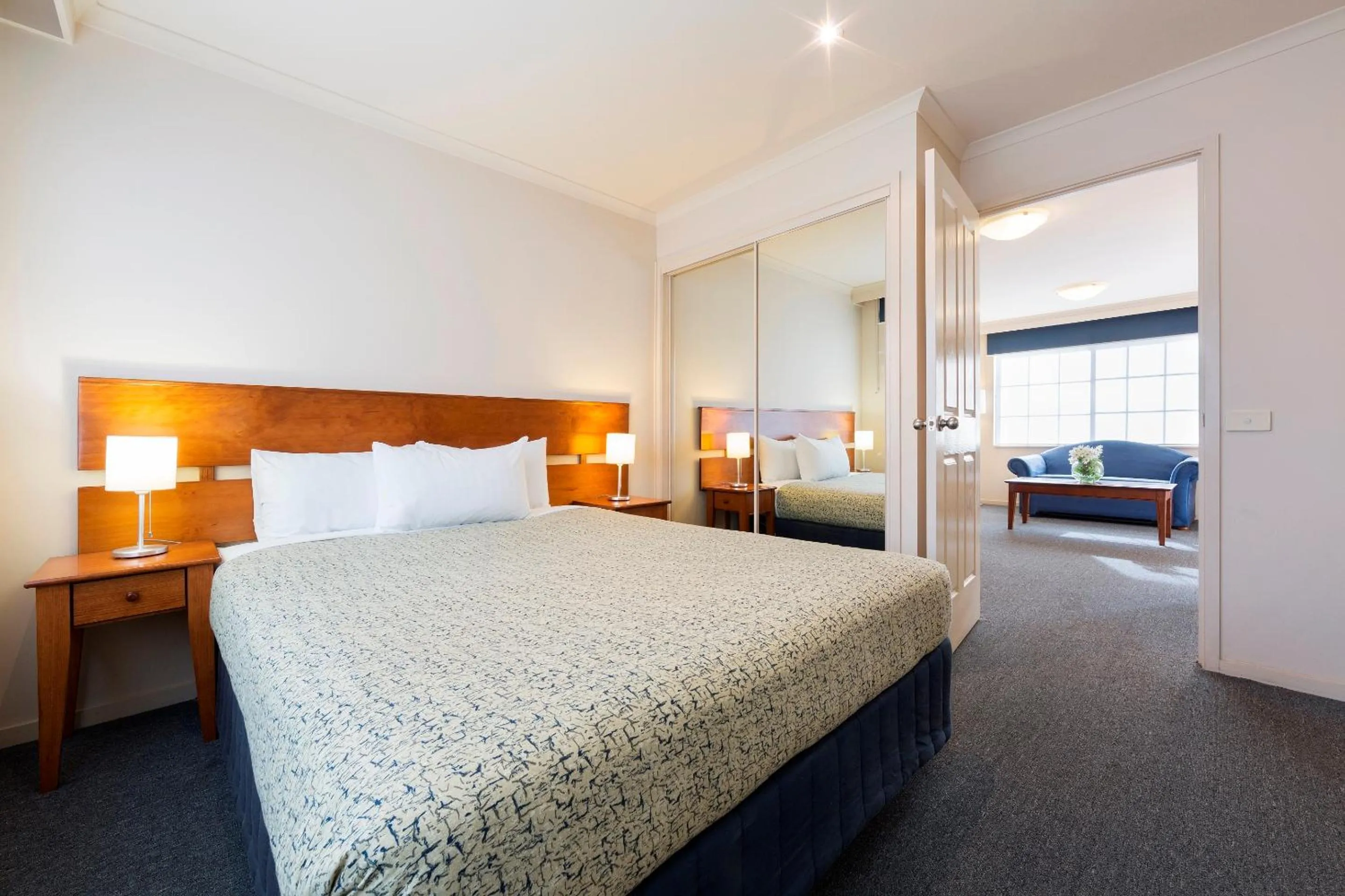 Bedroom, Bed in Canberra Parklands Central Apartment Hotel Official