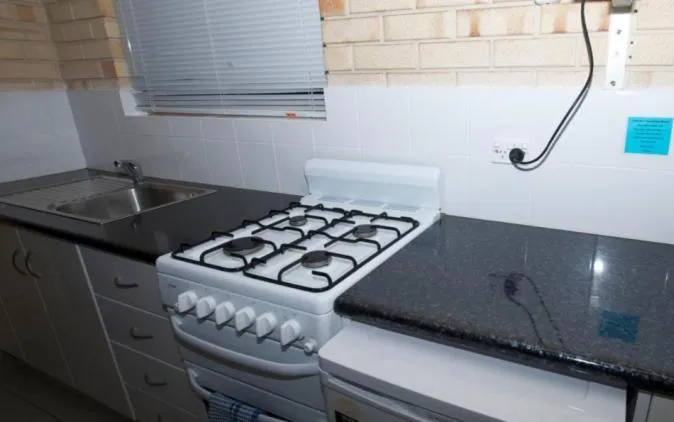 Kitchen or kitchenette in Esperance Beachfront Resort