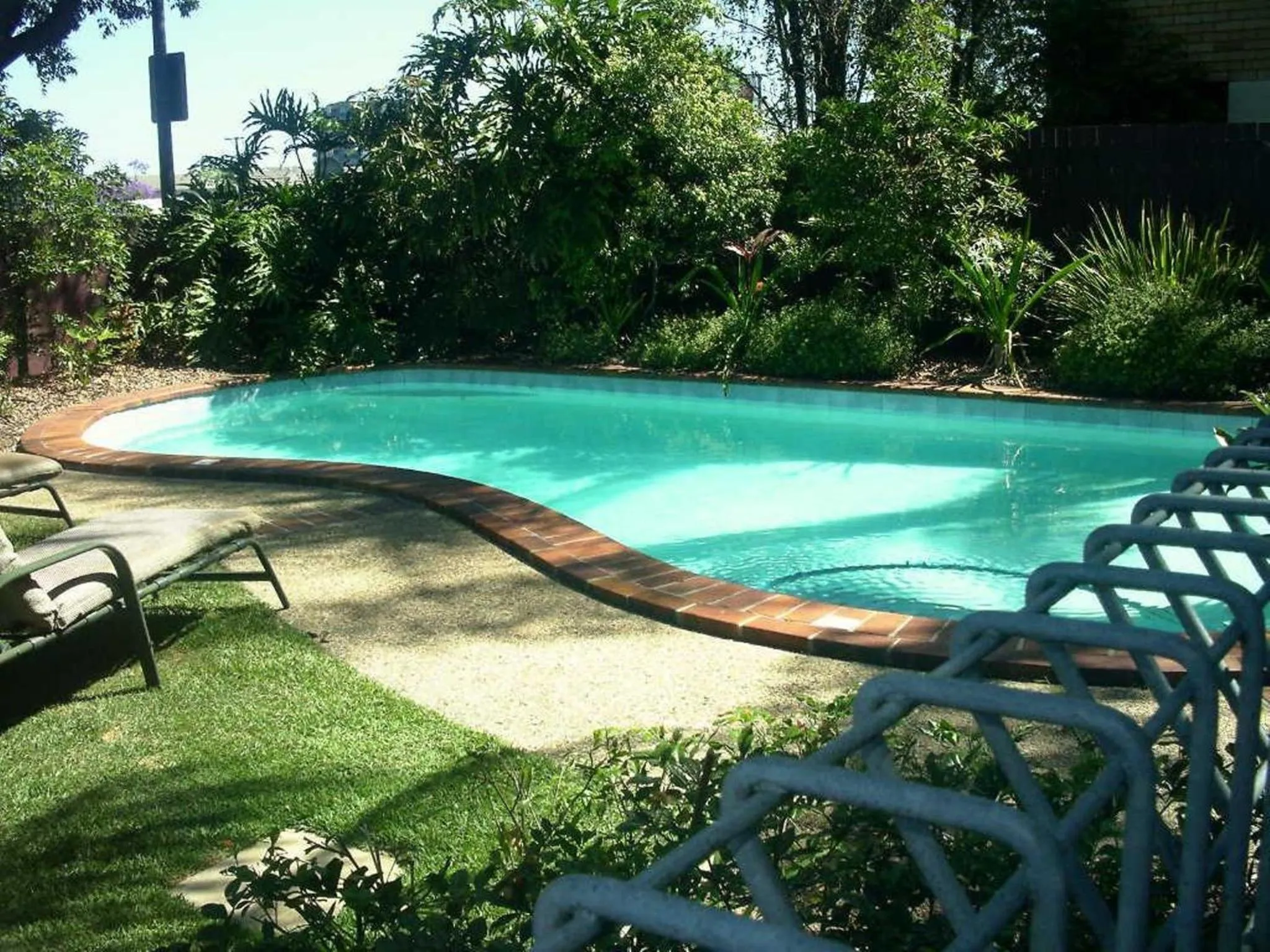Swimming pool in Airport Heritage Motel