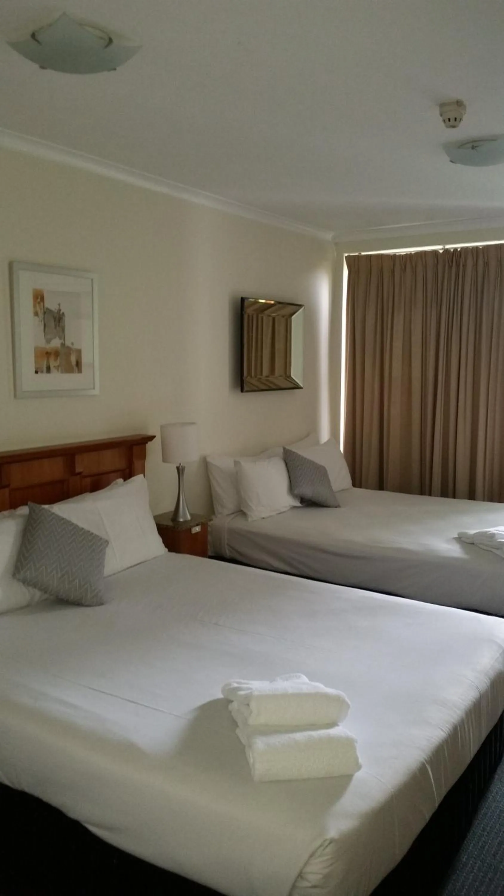 Bed in Airport Heritage Motel