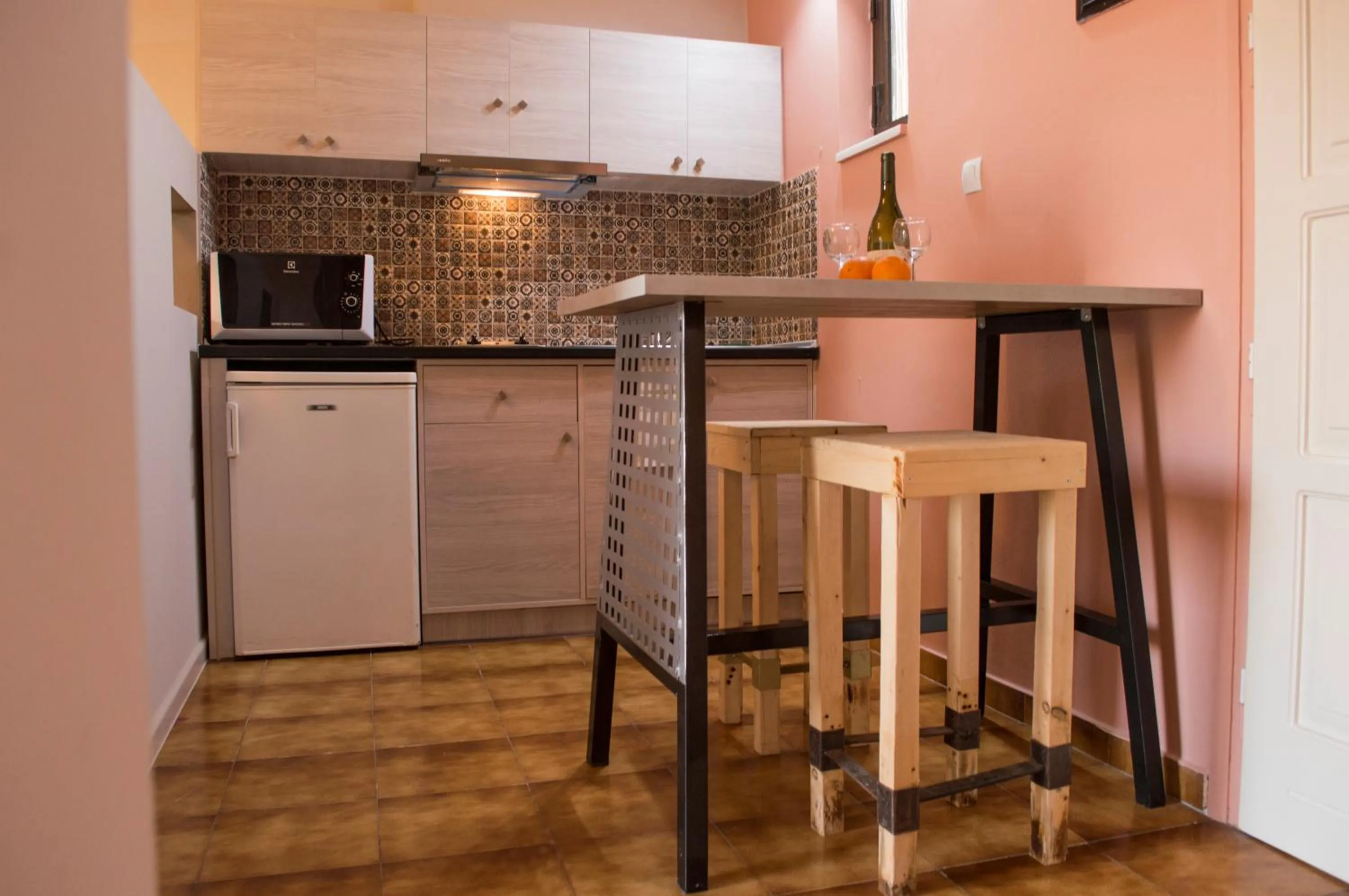 Kitchen or kitchenette in Nireas Hotel