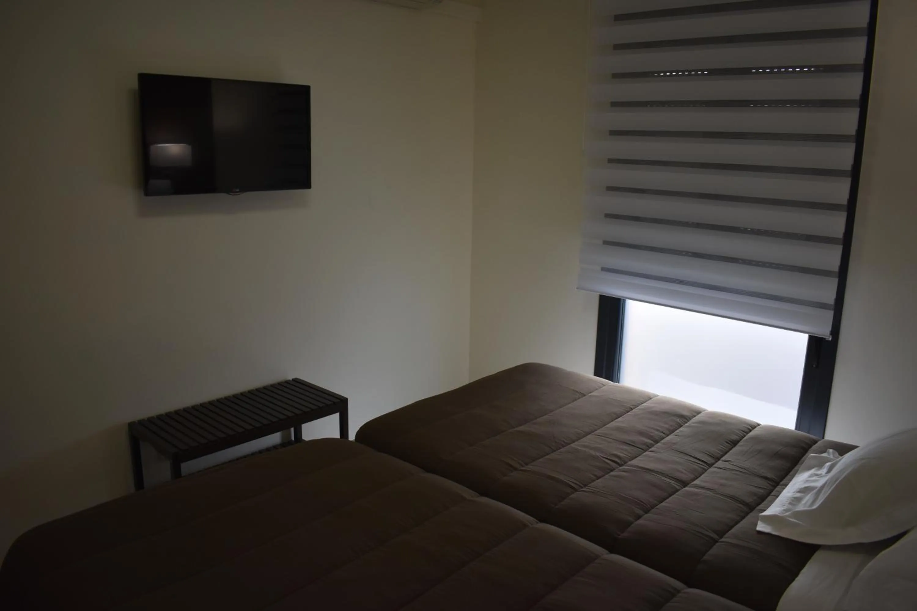 Photo of the whole room, Bed in Hostal el Rocio