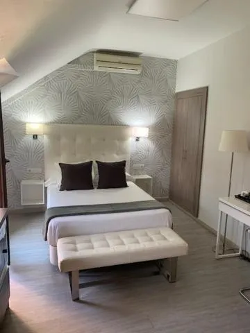 Bed in Hostal el Rocio