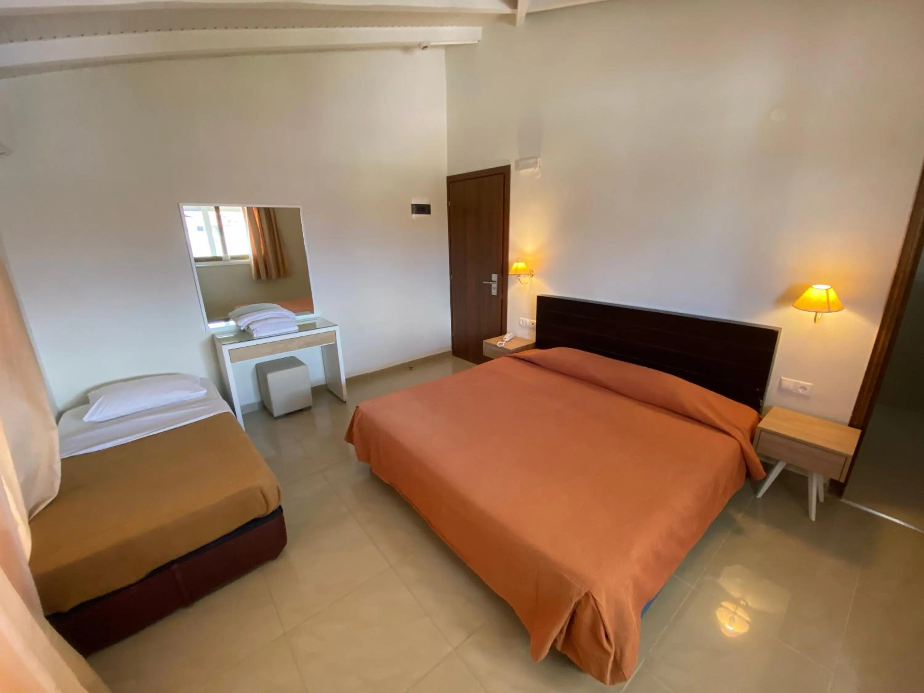 Bedroom in Hotel Platon Beach
