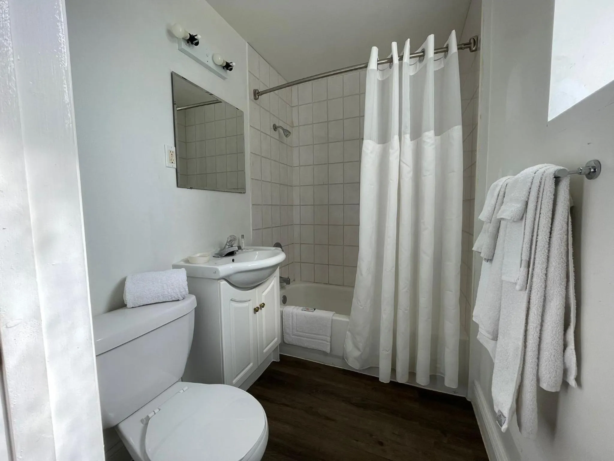 Bathroom in Travelodge by Wyndham London Ontario