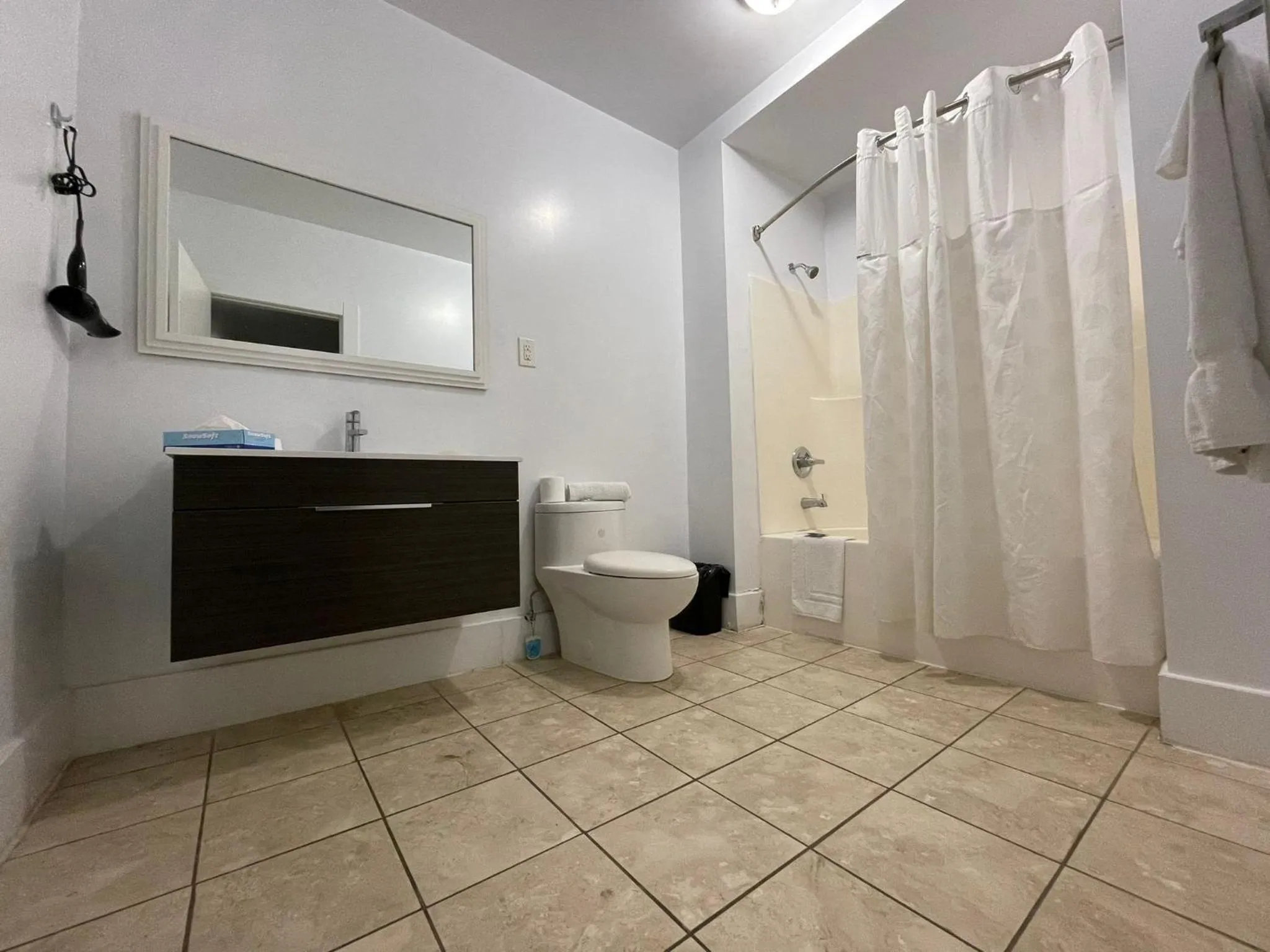 Bathroom in Travelodge by Wyndham London Ontario