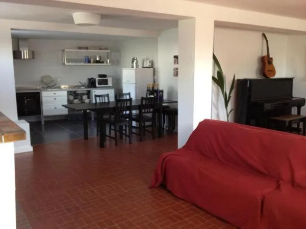 Seating area in AirPorto Hostel