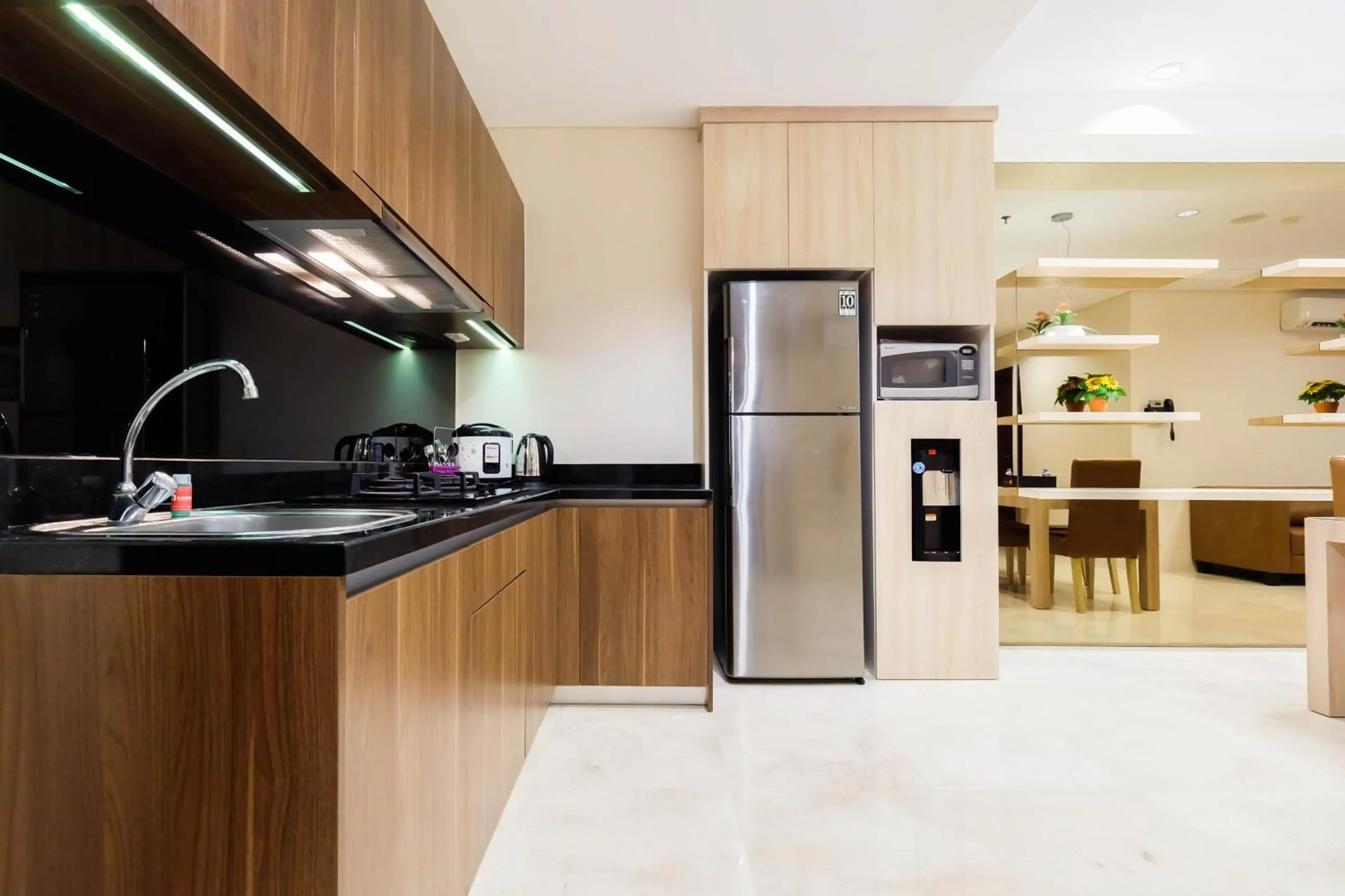 2BR Cozy and Modern L'Avenue Apartment By Travelio