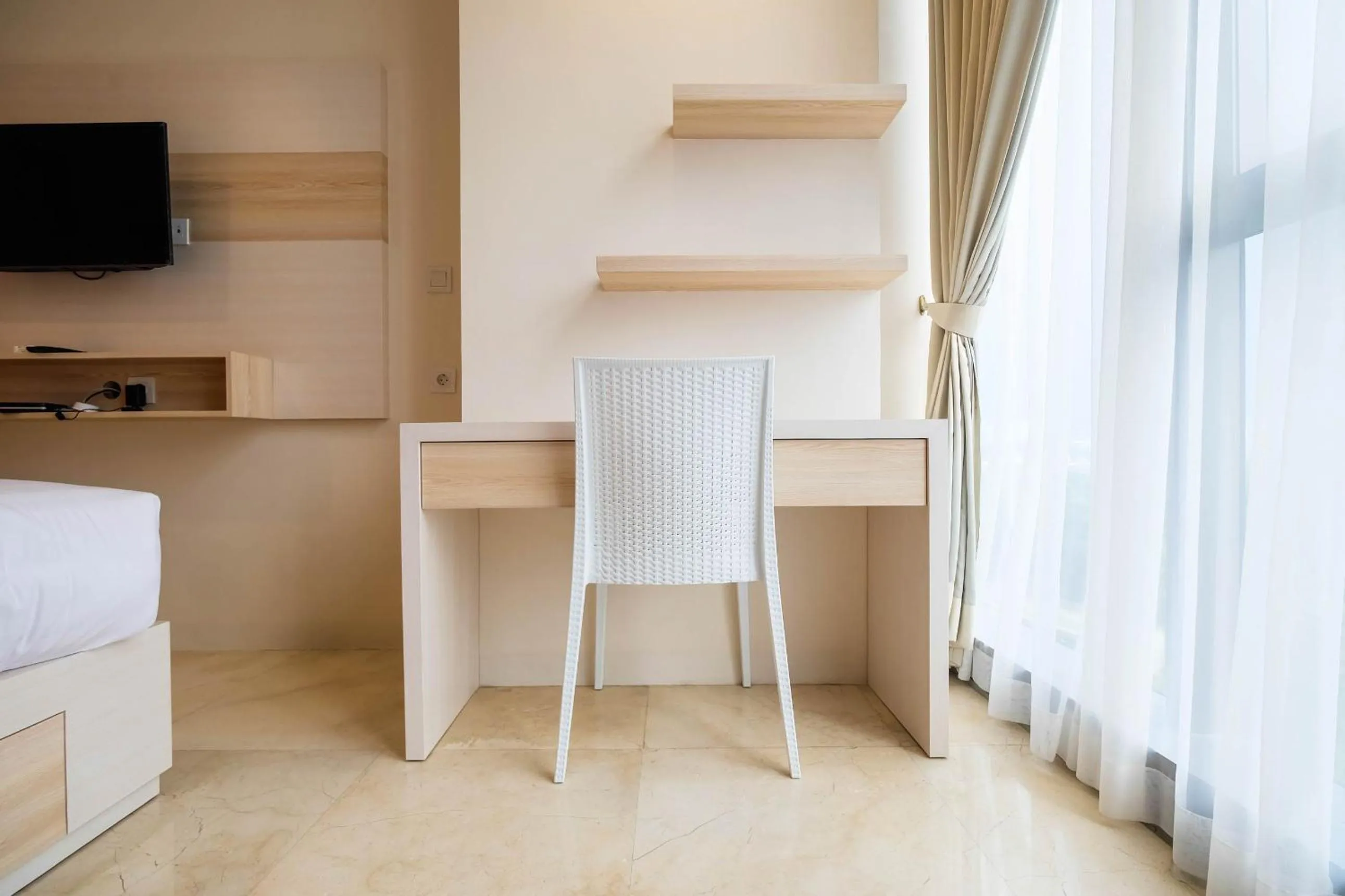 2BR Cozy and Modern L'Avenue Apartment By Travelio