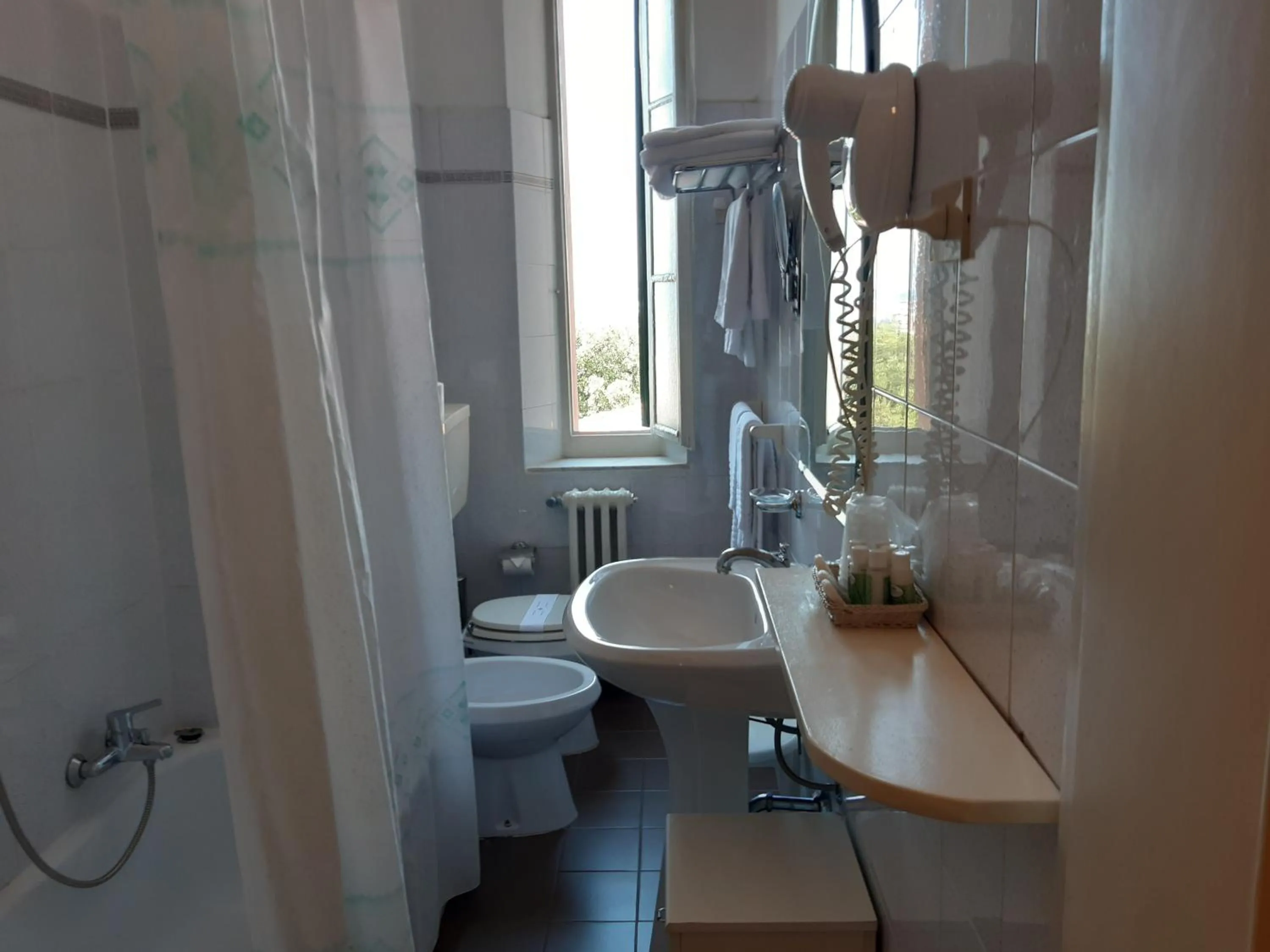 Family Room (2 Adults + 2 Children) in Hotel Italia