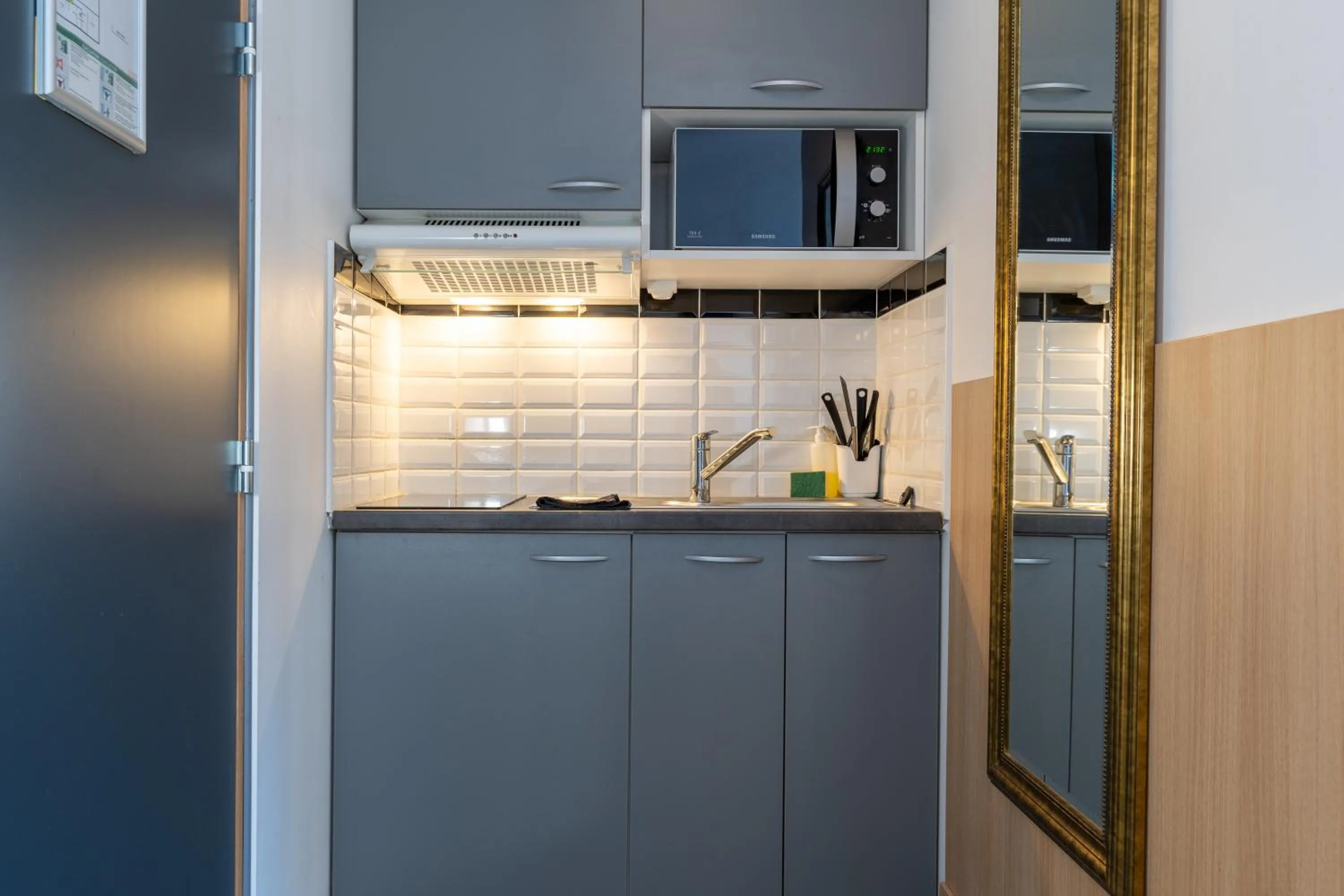 Kitchen or kitchenette in CALM Appart' & Hostel