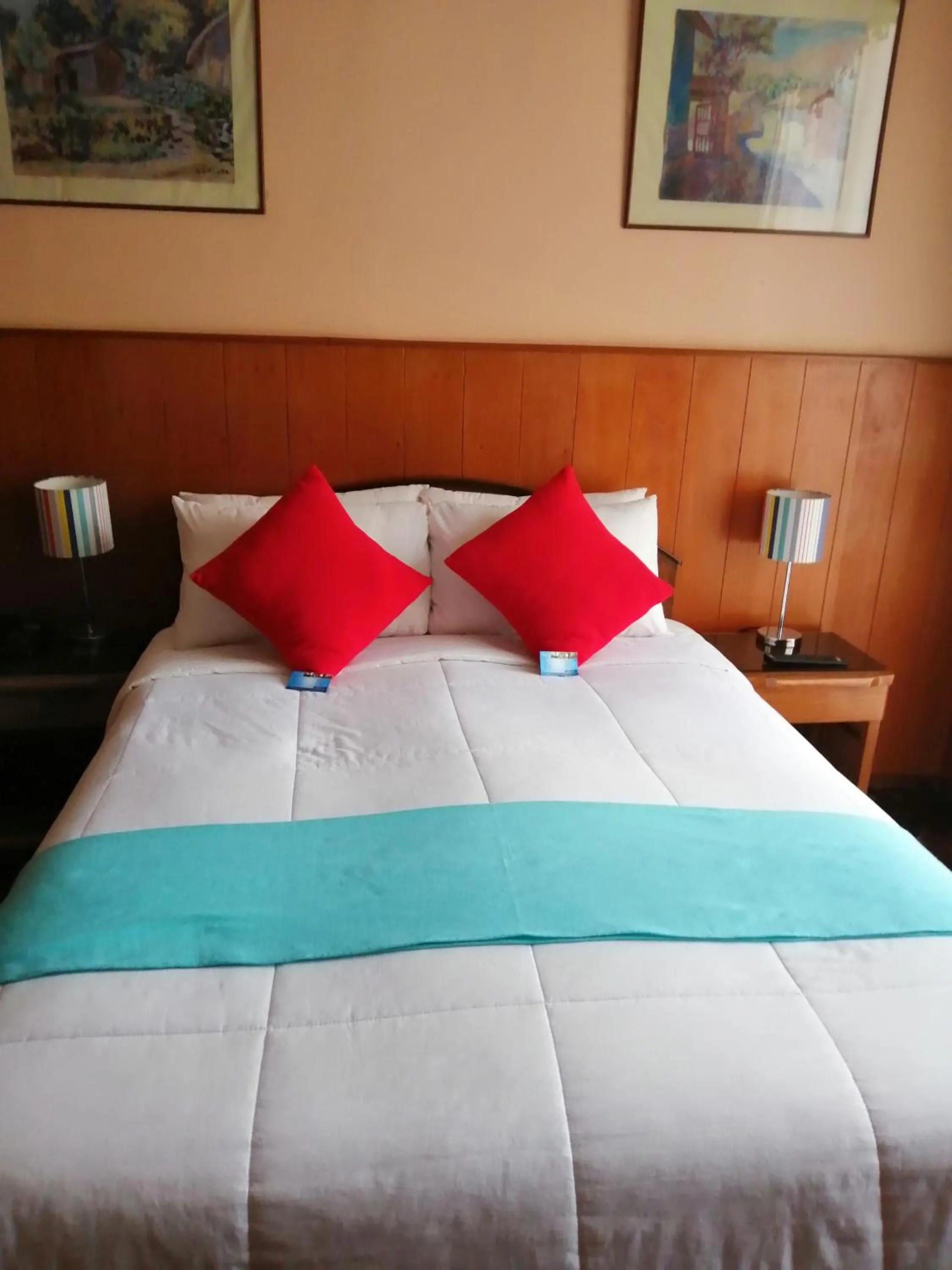 Bed in Huaytusive Inn Hotel