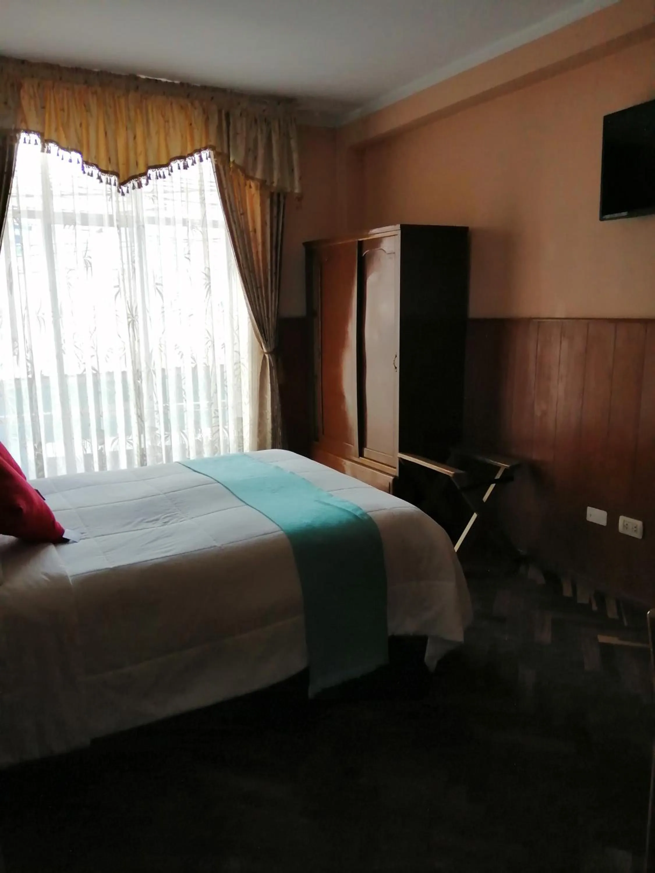 Photo of the whole room, Bed in Huaytusive Inn Hotel