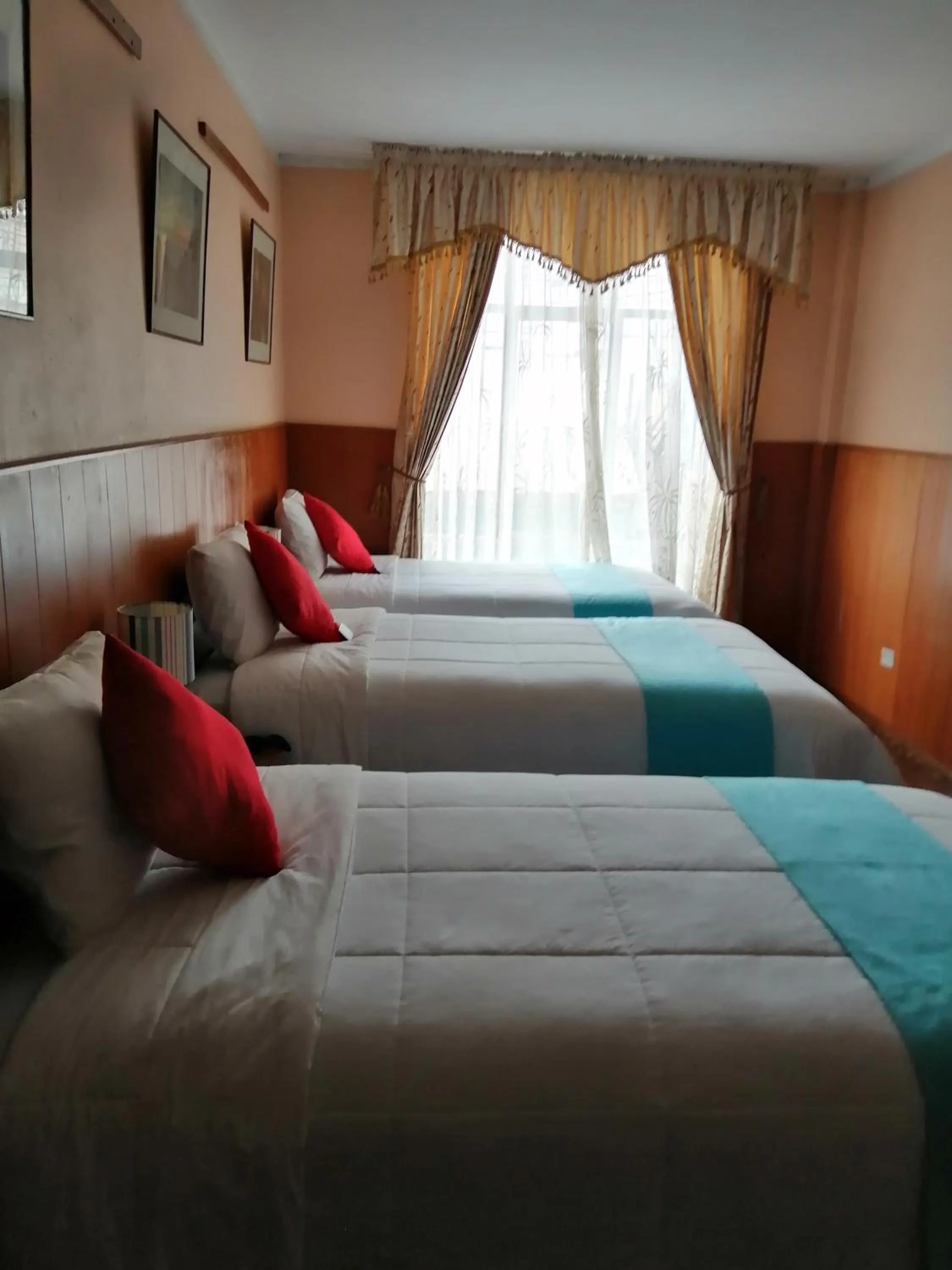 Photo of the whole room, Bed in Huaytusive Inn Hotel