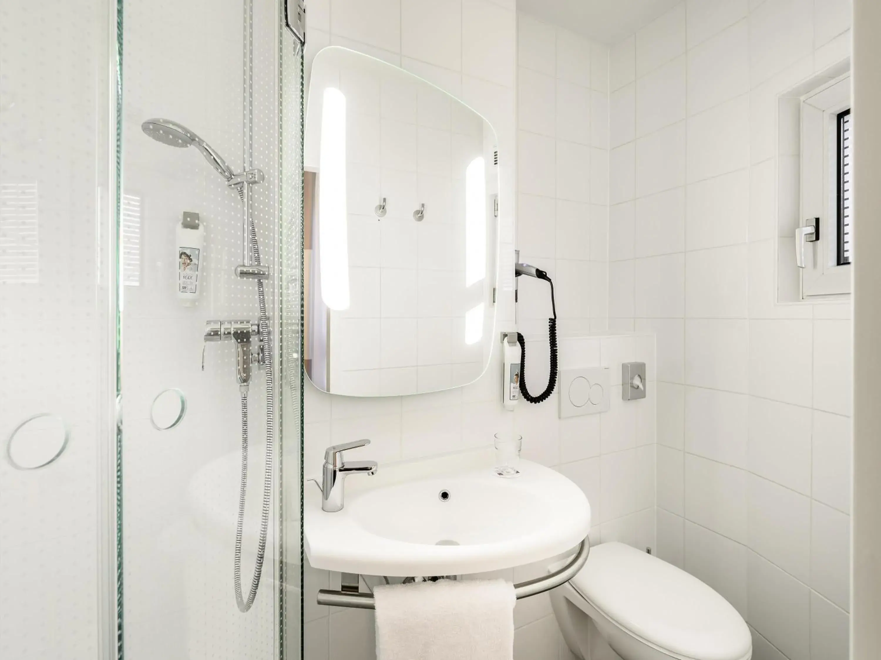 Bedroom in ibis Hotel München City Bedroom in ibis Hotel München City