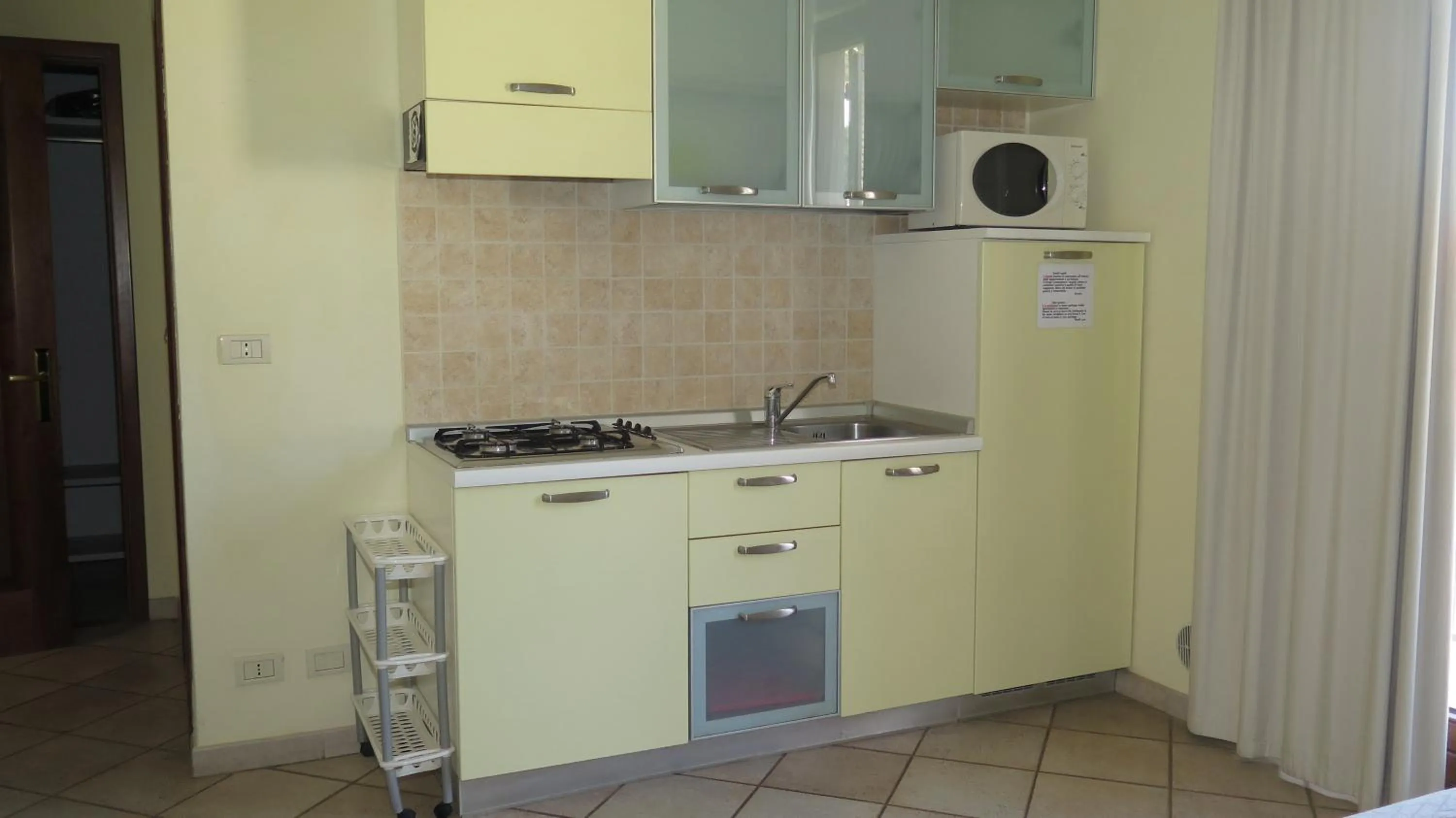 Kitchen or kitchenette in Residenza Turistico Alberghiera Corallo