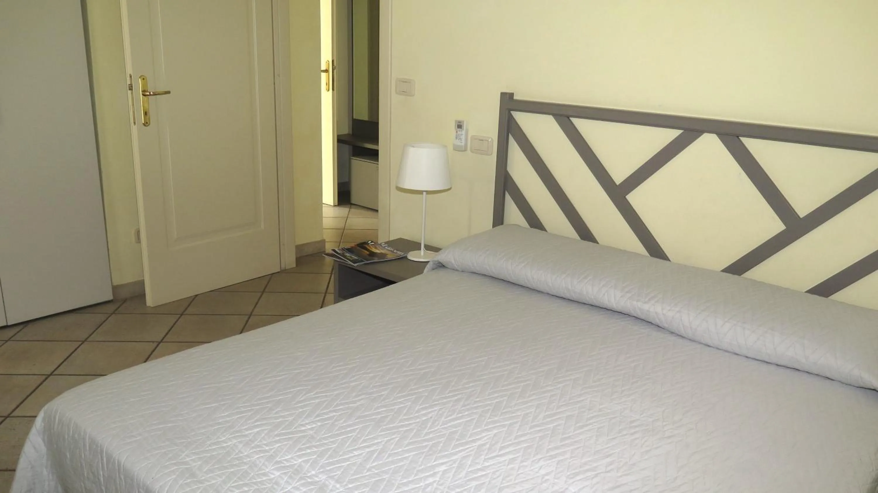 Bedroom, Bed in Residenza Turistico Alberghiera Corallo