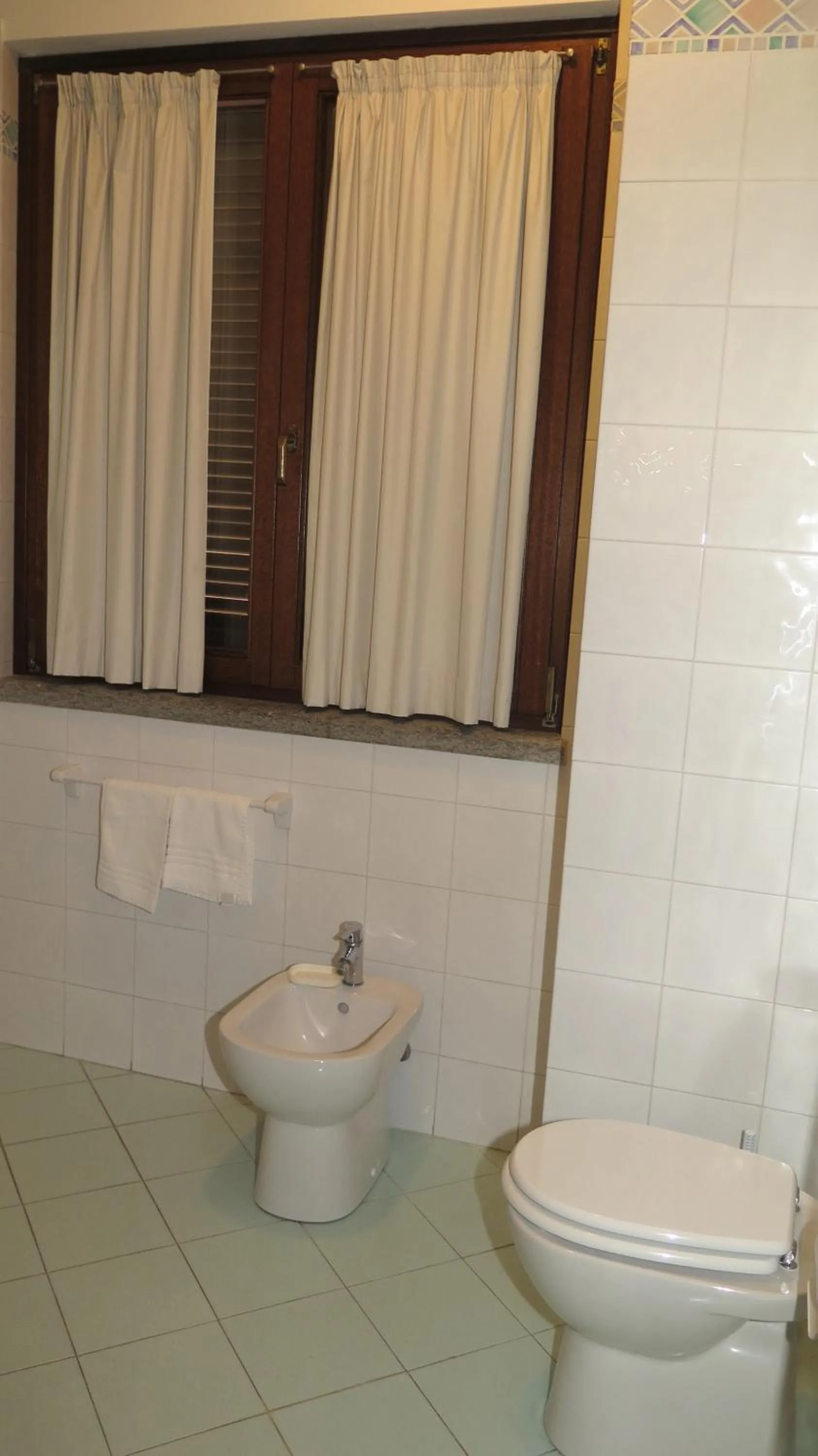 Toilet in Residenza Turistico Alberghiera Corallo