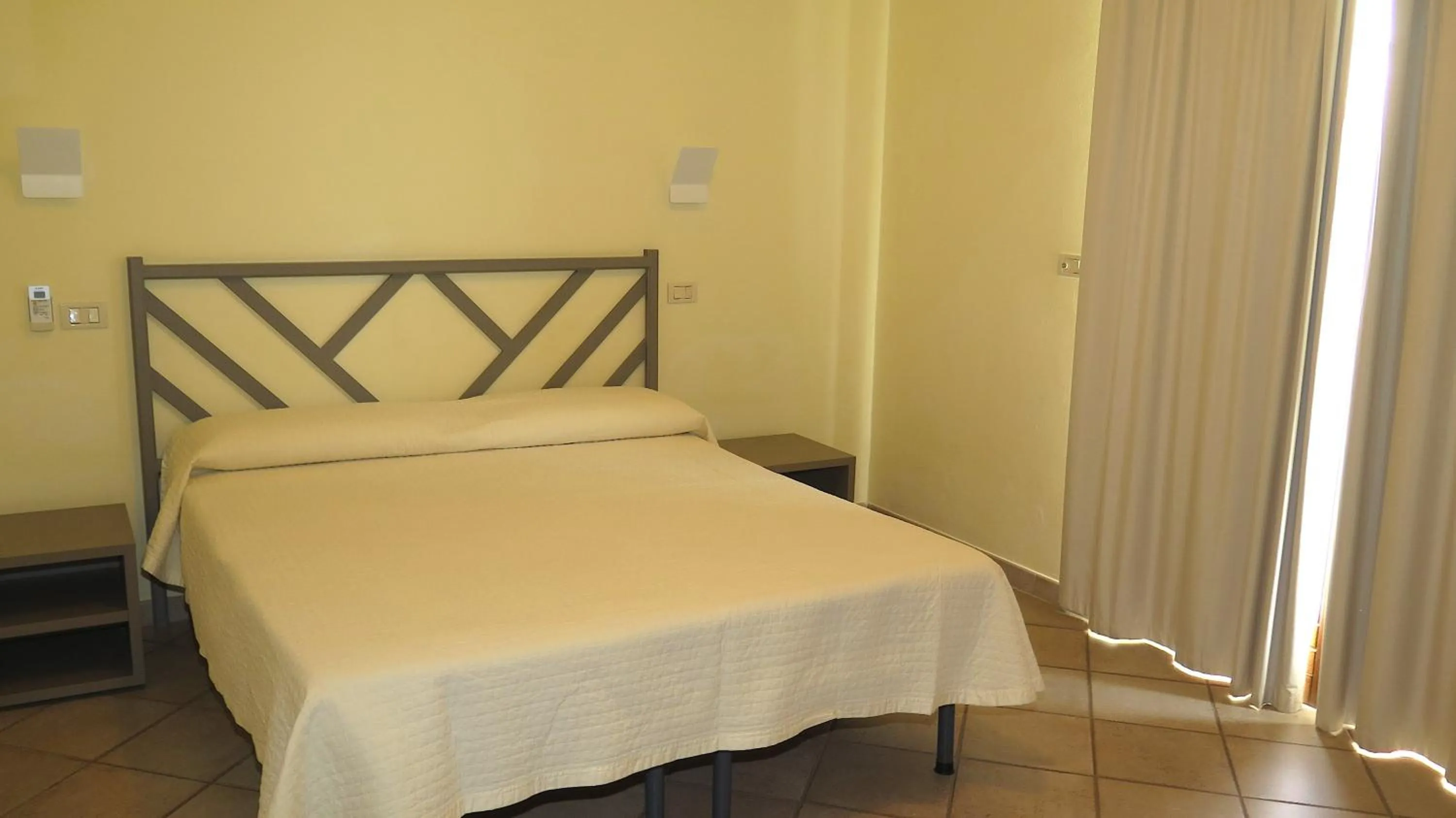 Bedroom, Bed in Residenza Turistico Alberghiera Corallo