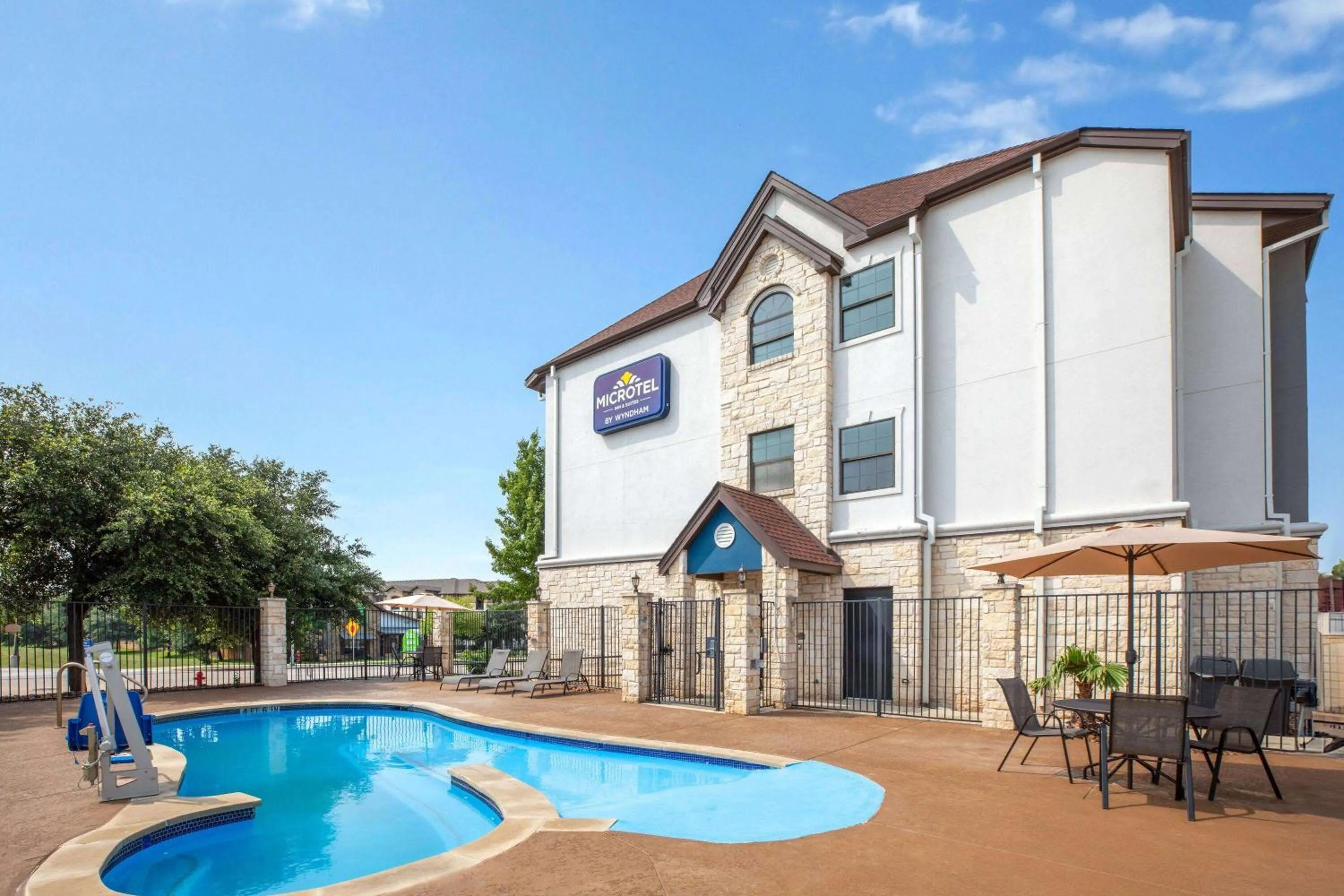 Pool view in Microtel Inn & Suites by Wyndham Buda Austin South