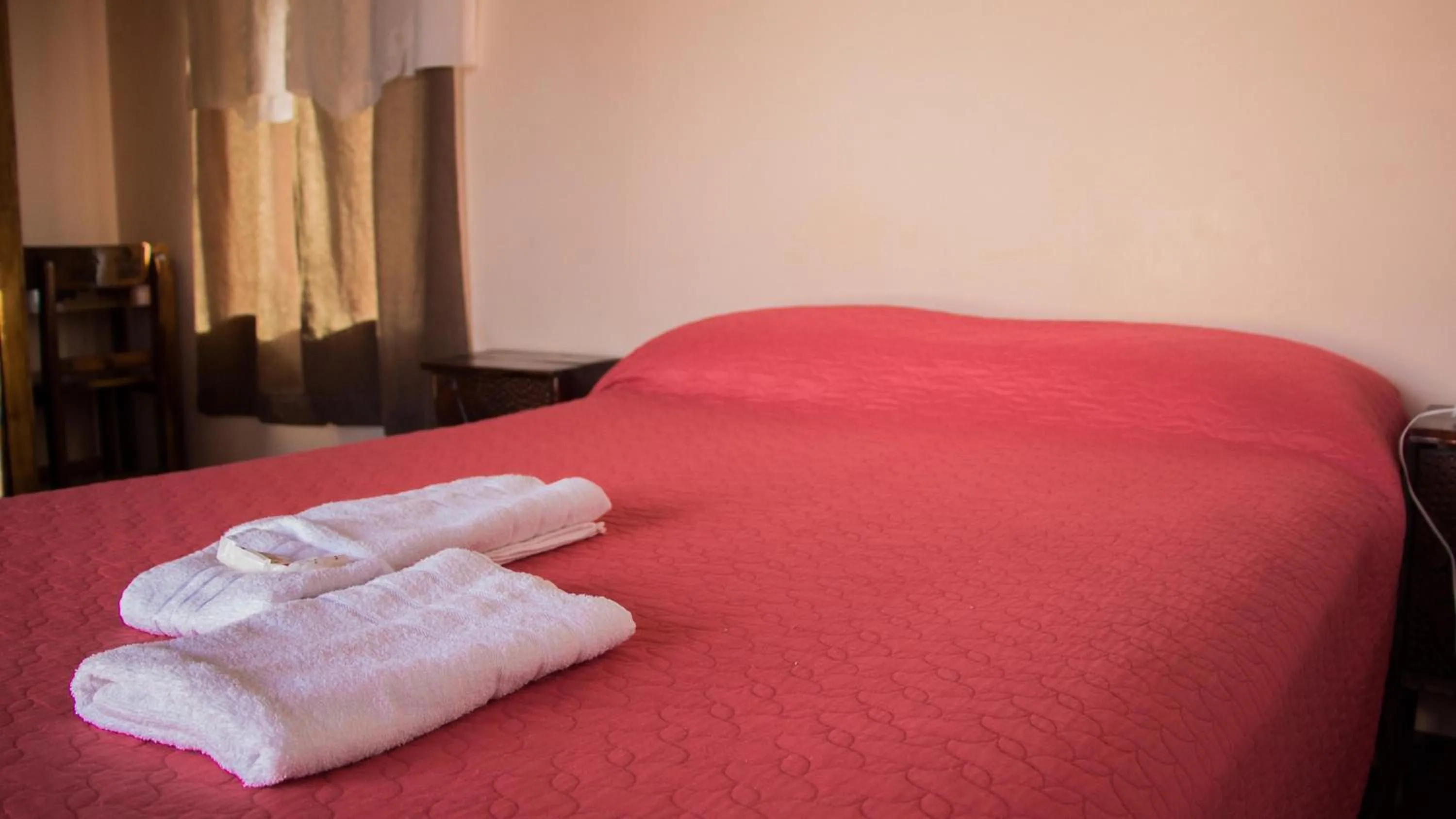 Living room, Bed in Divina Presencia