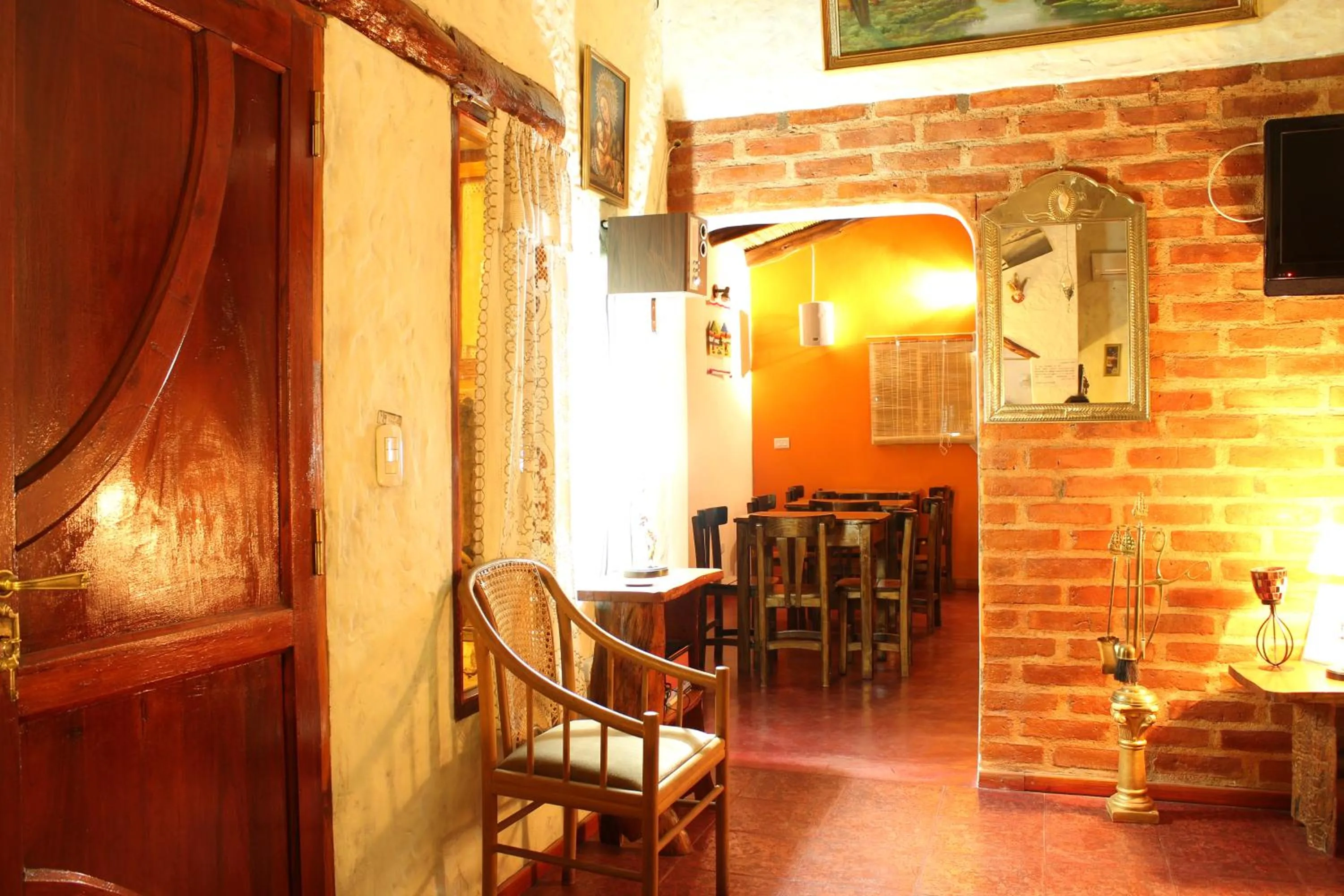 Communal lounge/ TV room in Divina Presencia