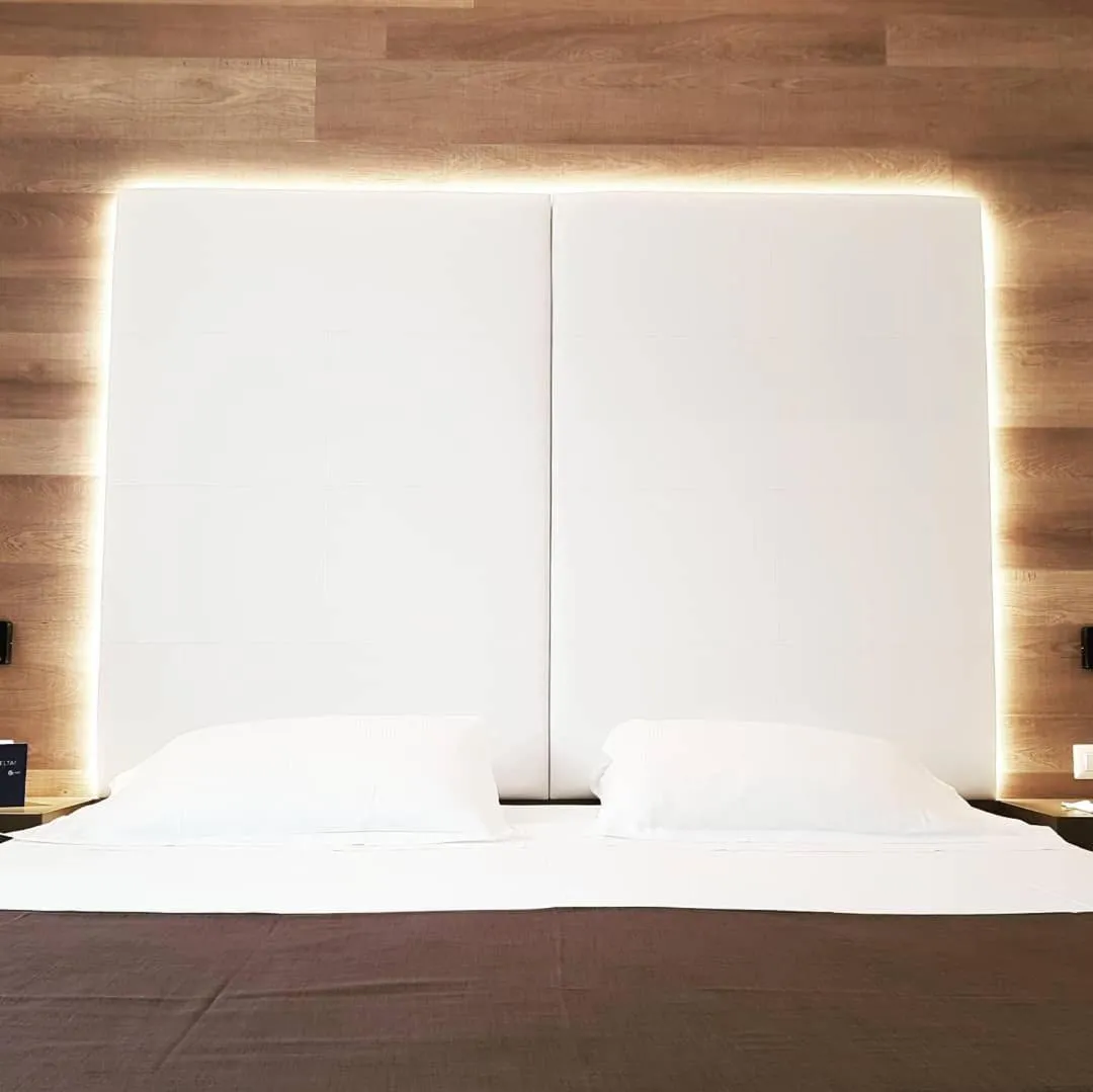 Bed in City Hotel & Suites