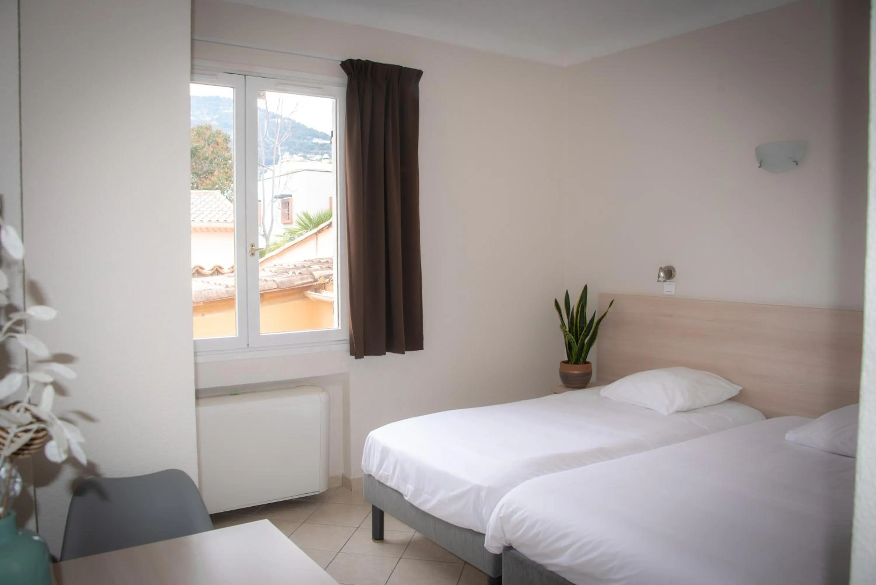 Bed in Hotel et Appartements Reine D'Azur