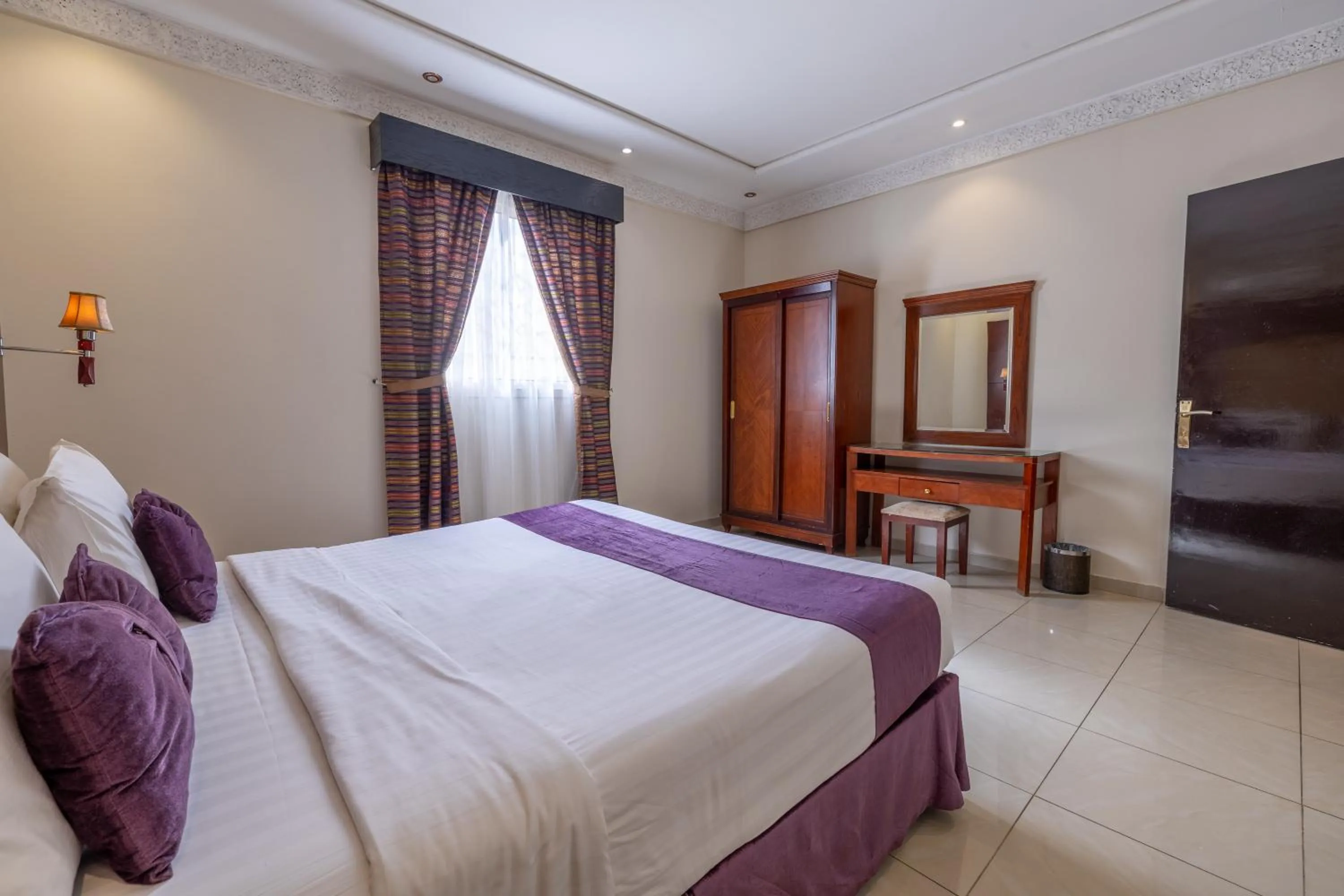 Bed in Dar NEYAARA SERVICED APARTMENTS