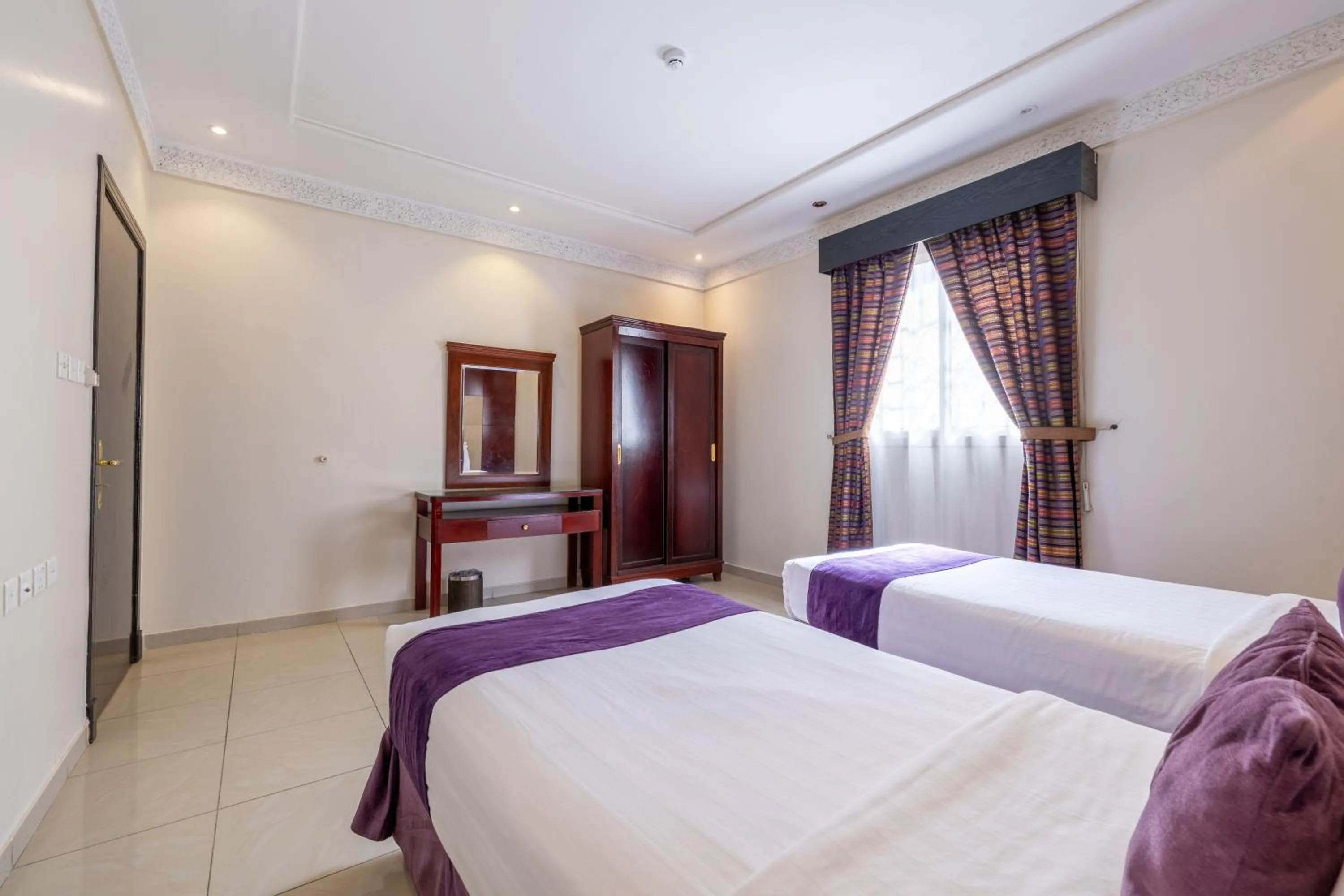 Bed in Dar NEYAARA SERVICED APARTMENTS