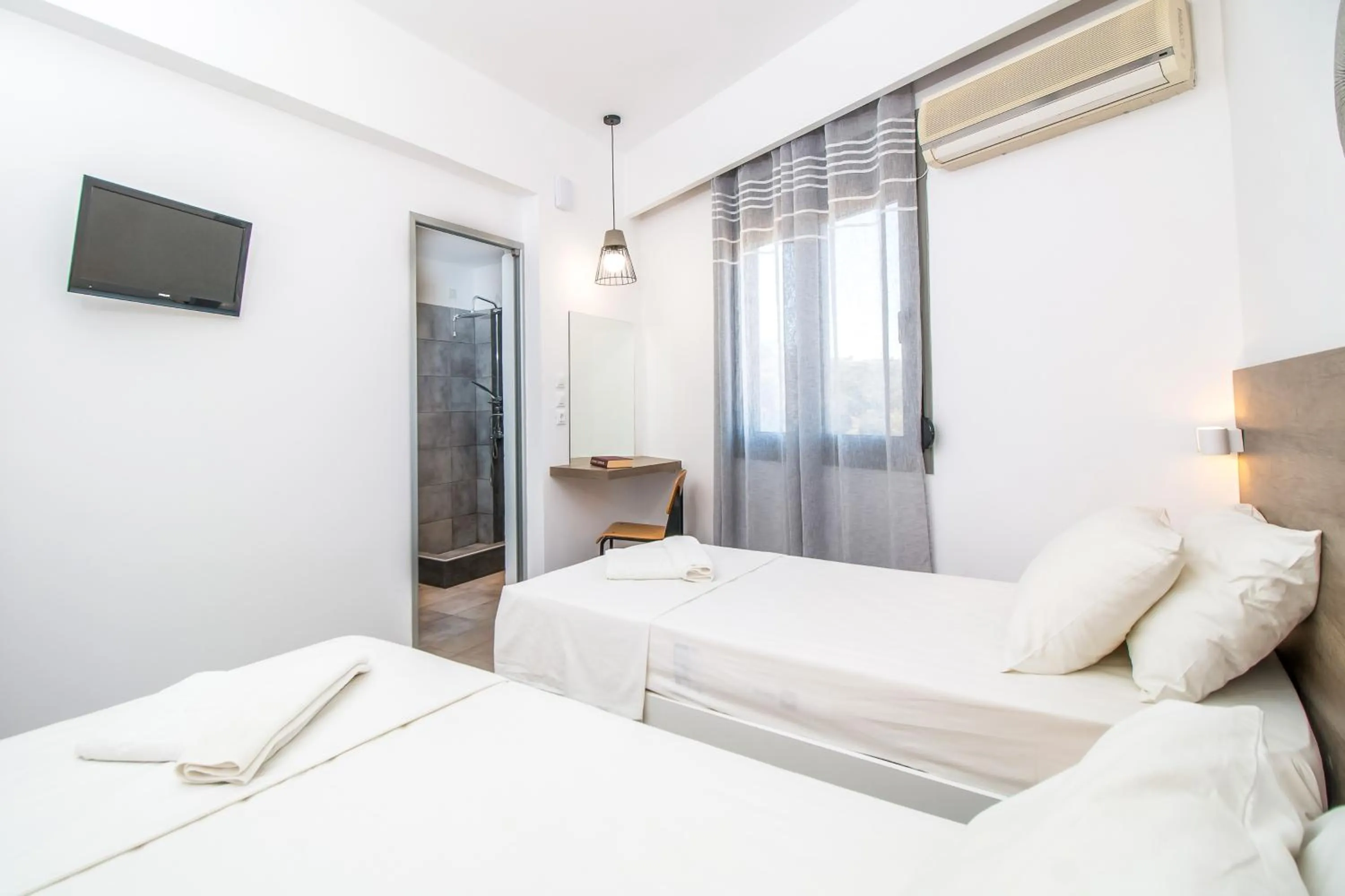 Bed in Hillside Studios & Apartments