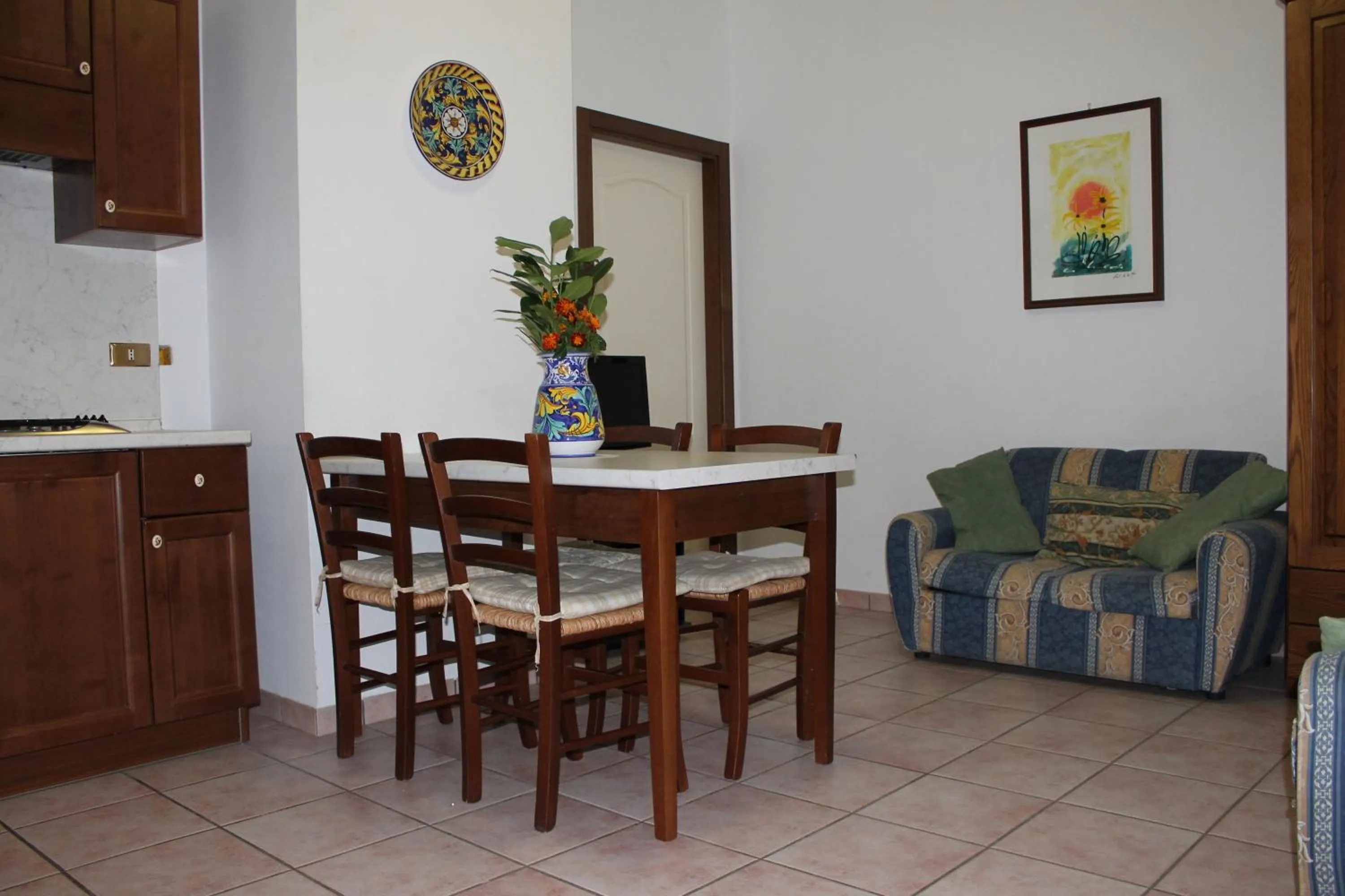 Kitchen or kitchenette in Residence La Piscina