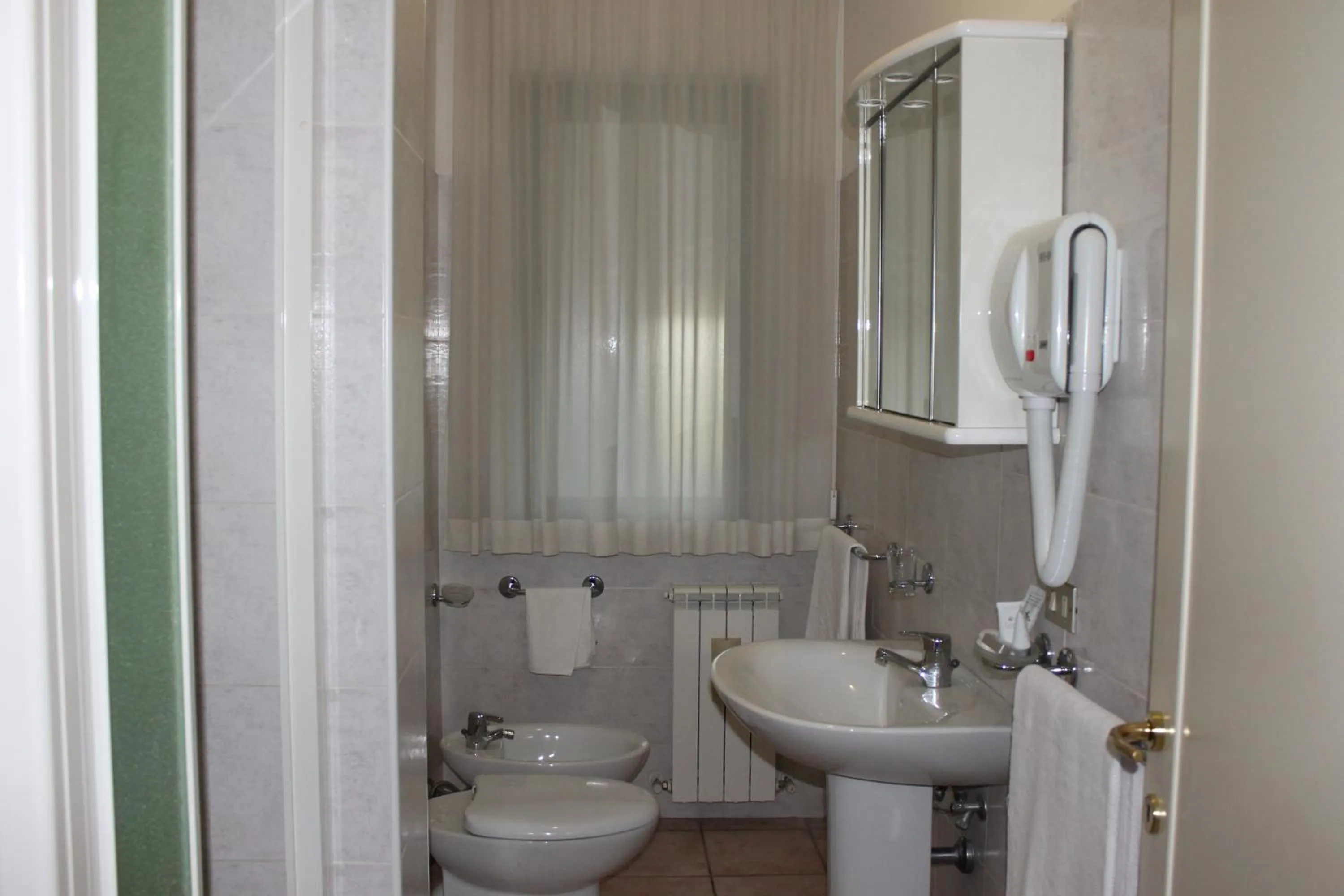 Bathroom in Residence La Piscina