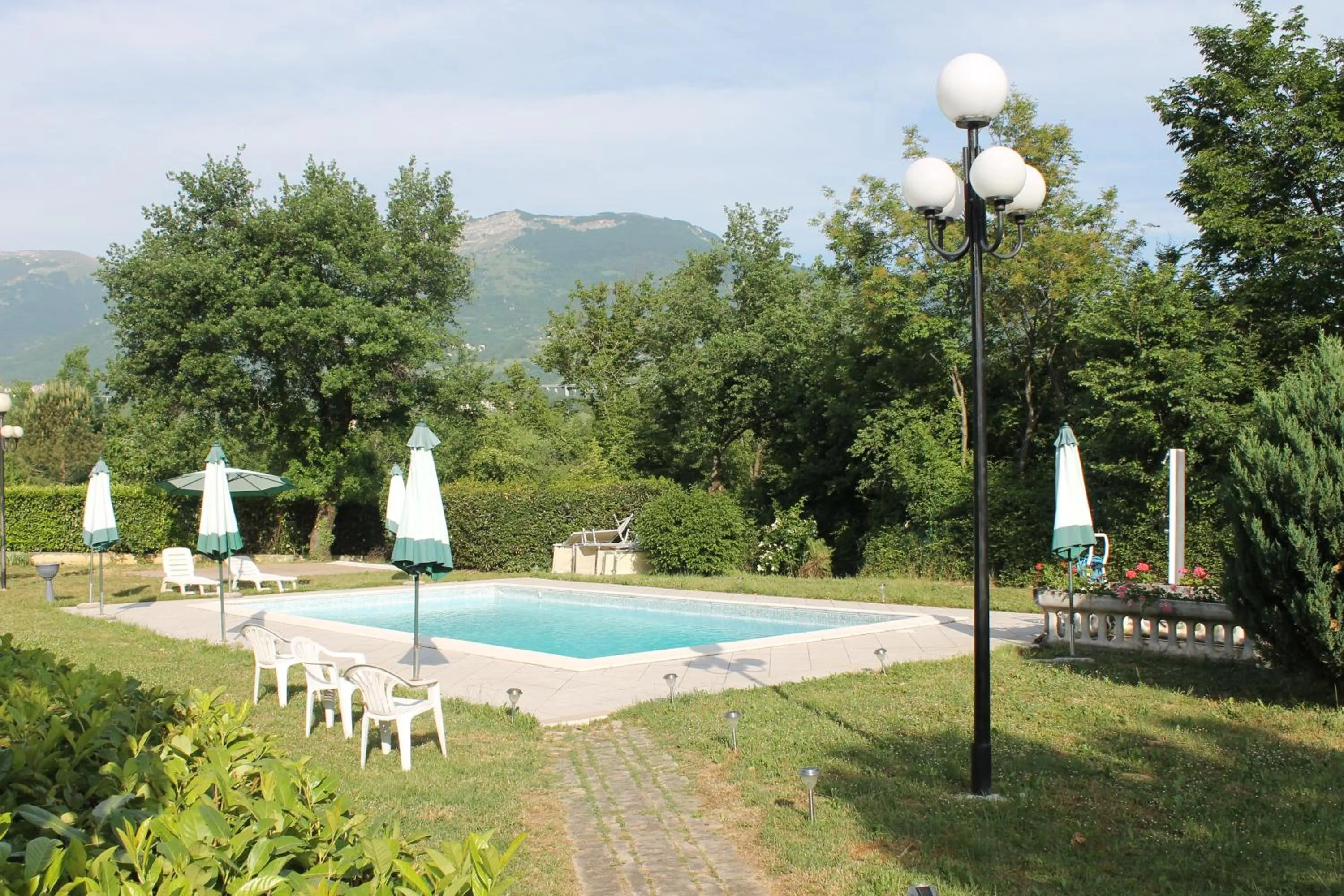 Pool view in Residence La Piscina