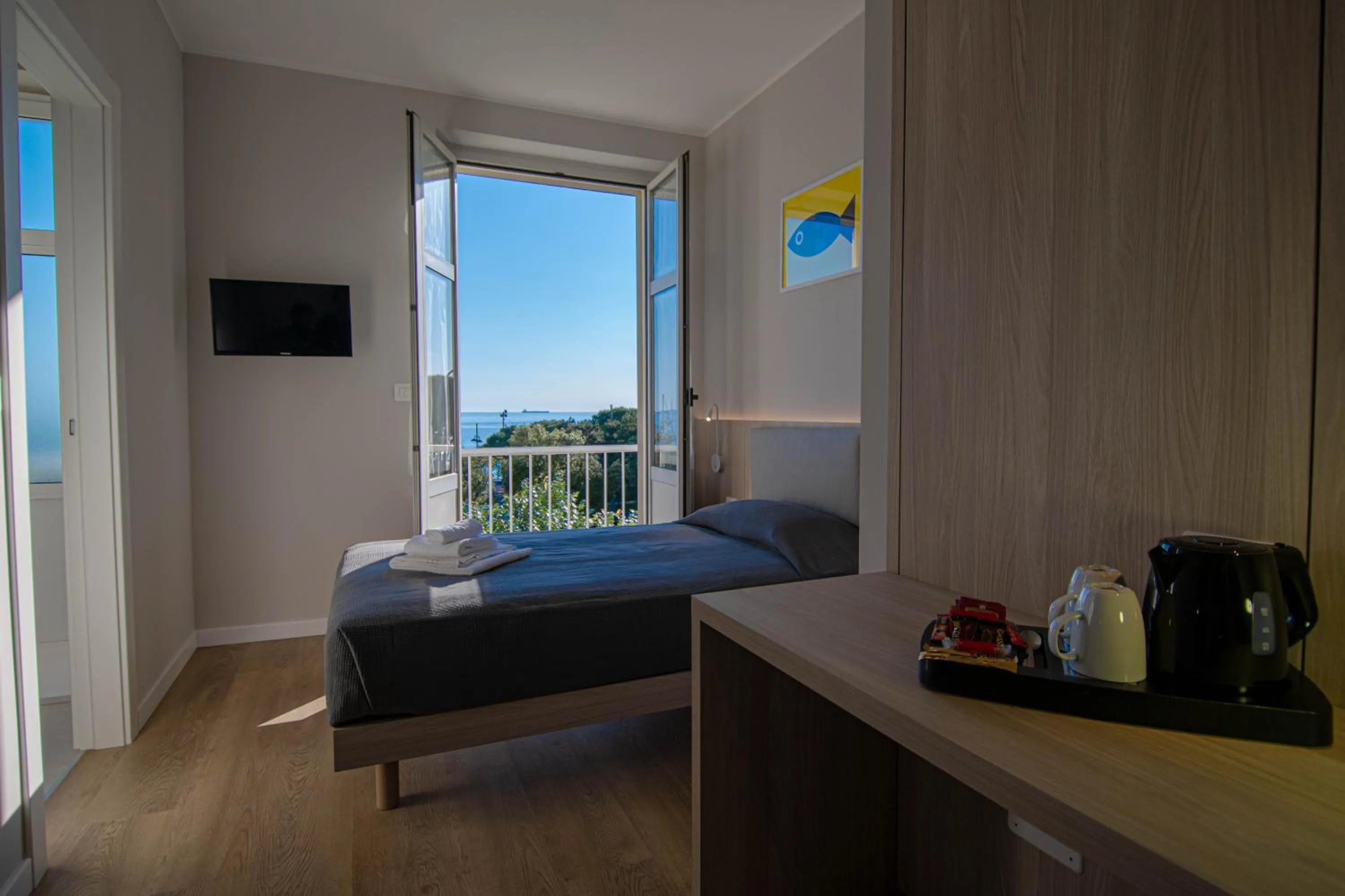 Bed in Hotel Tritone