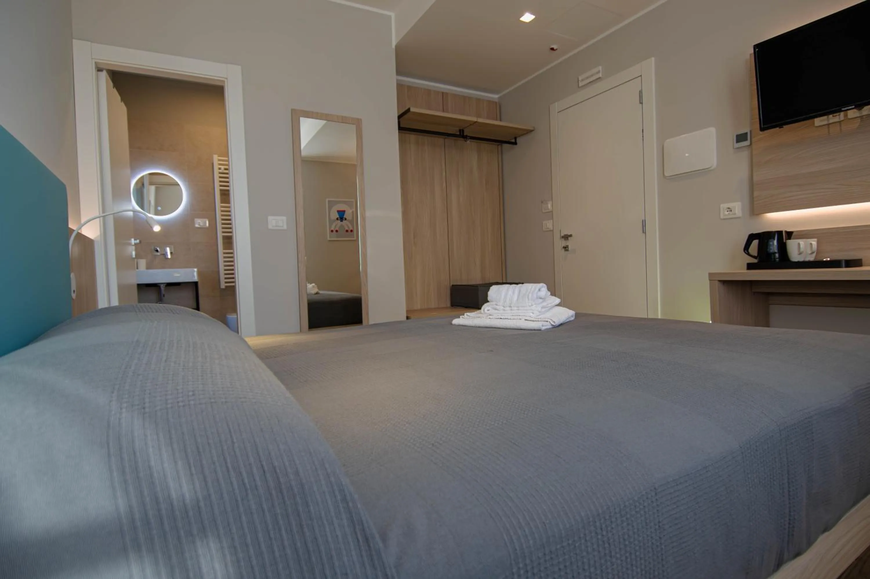 Bed in Hotel Tritone