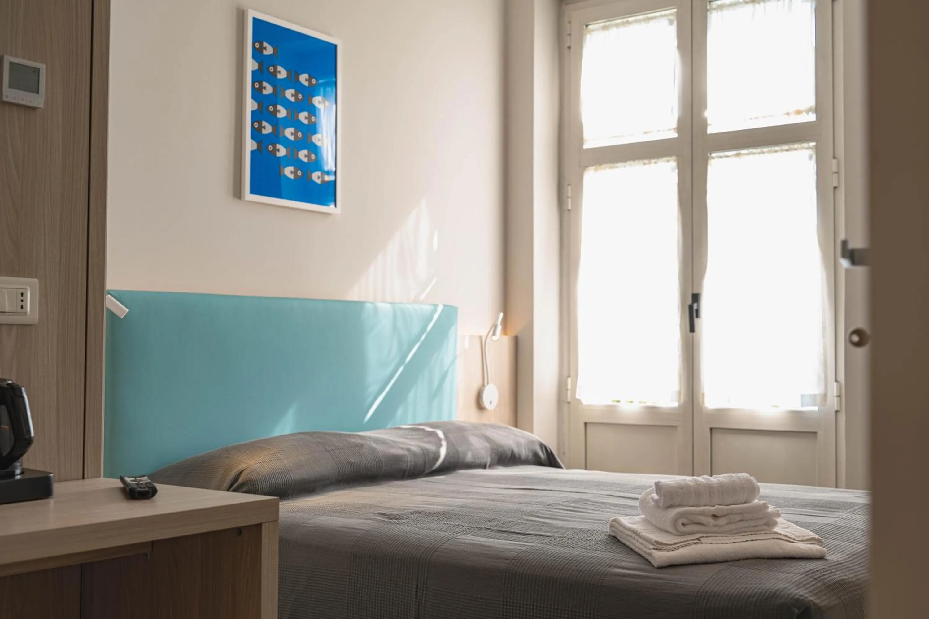 Bed in Hotel Tritone