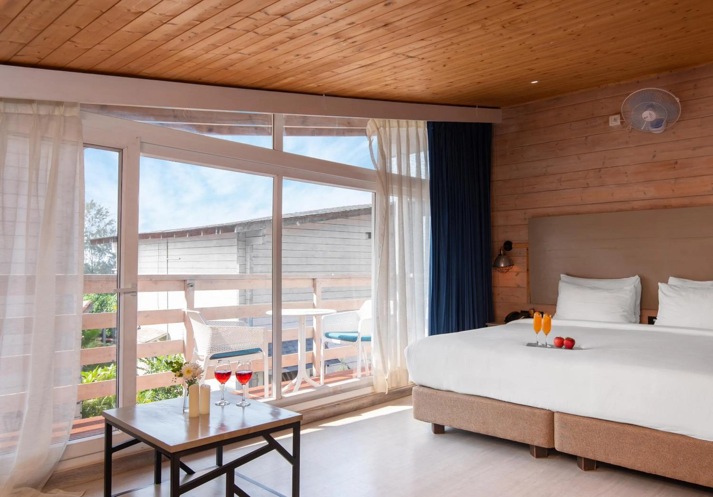 Photo of the whole room, Bed in Living Room Beach Resort