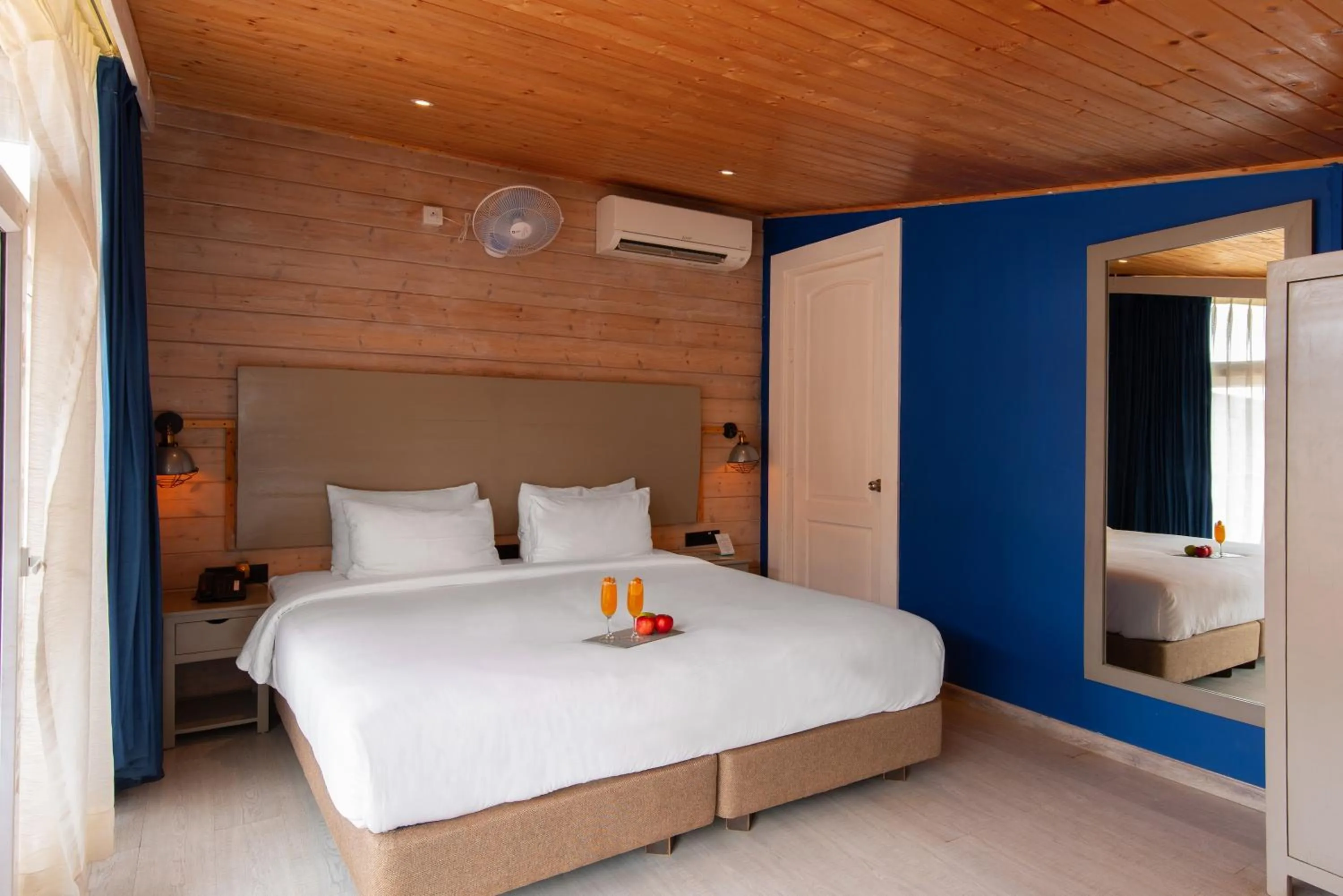 Photo of the whole room, Bed in Living Room Beach Resort